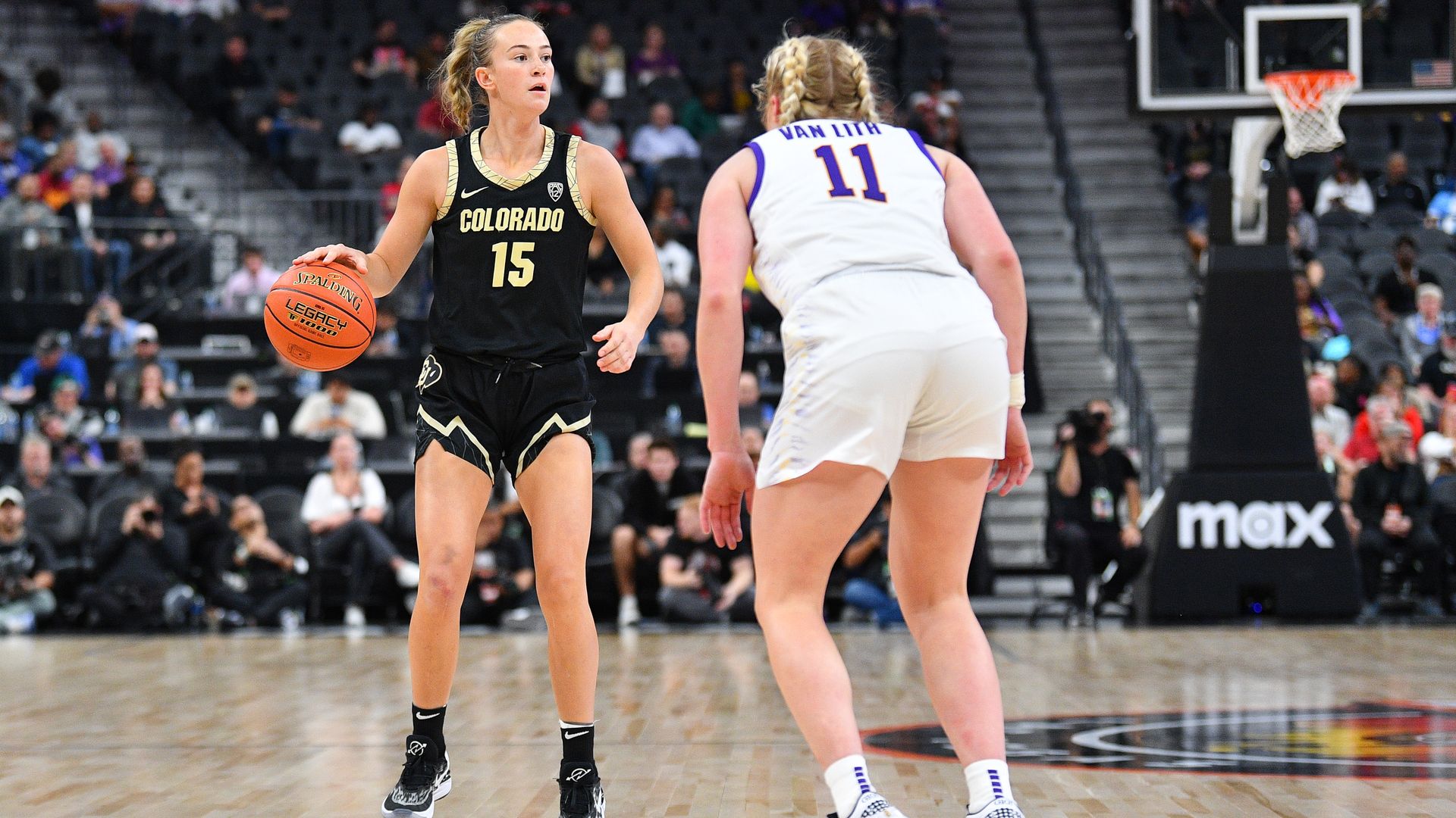 Colorado Buffaloes guard Kindyll Wetta (15) dribbles up the court during the Hall of Fame Series, a women's college basketball game between the LSU Tigers and the Colorado Buffaloes on November 6, 2023 at T-Mobile Arena in Las Vegas, NV.
