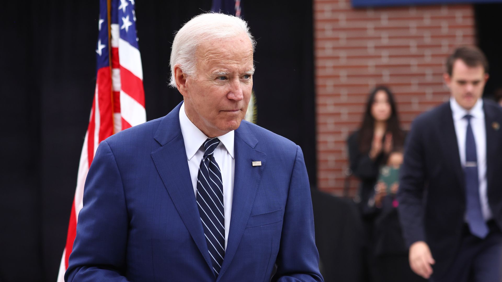 President Joe Biden walks from the podium after delivering remarks on lowering costs for American families at Irvine Valley College in Orange County on October 14, 2022 in Irvine, California