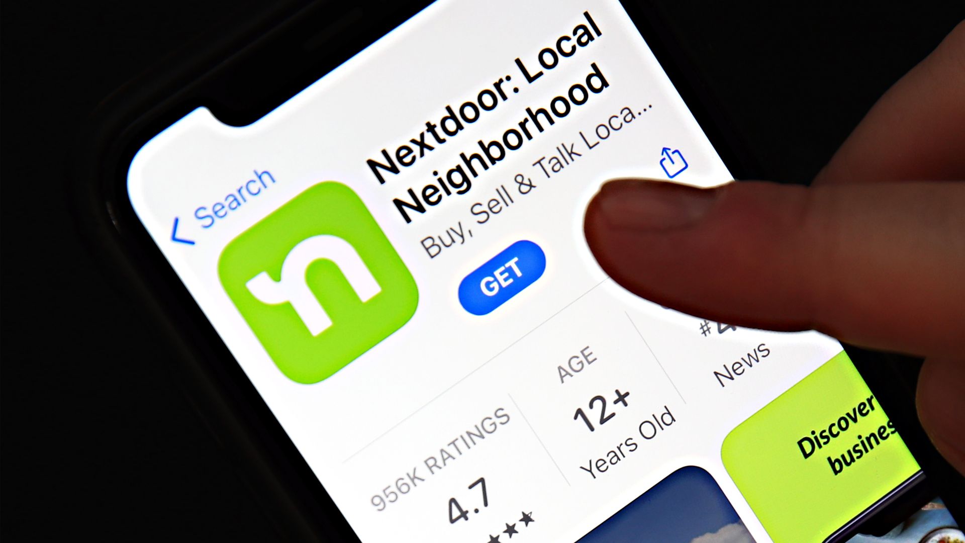 The Nextdoor app download screen seen on a smartphone.