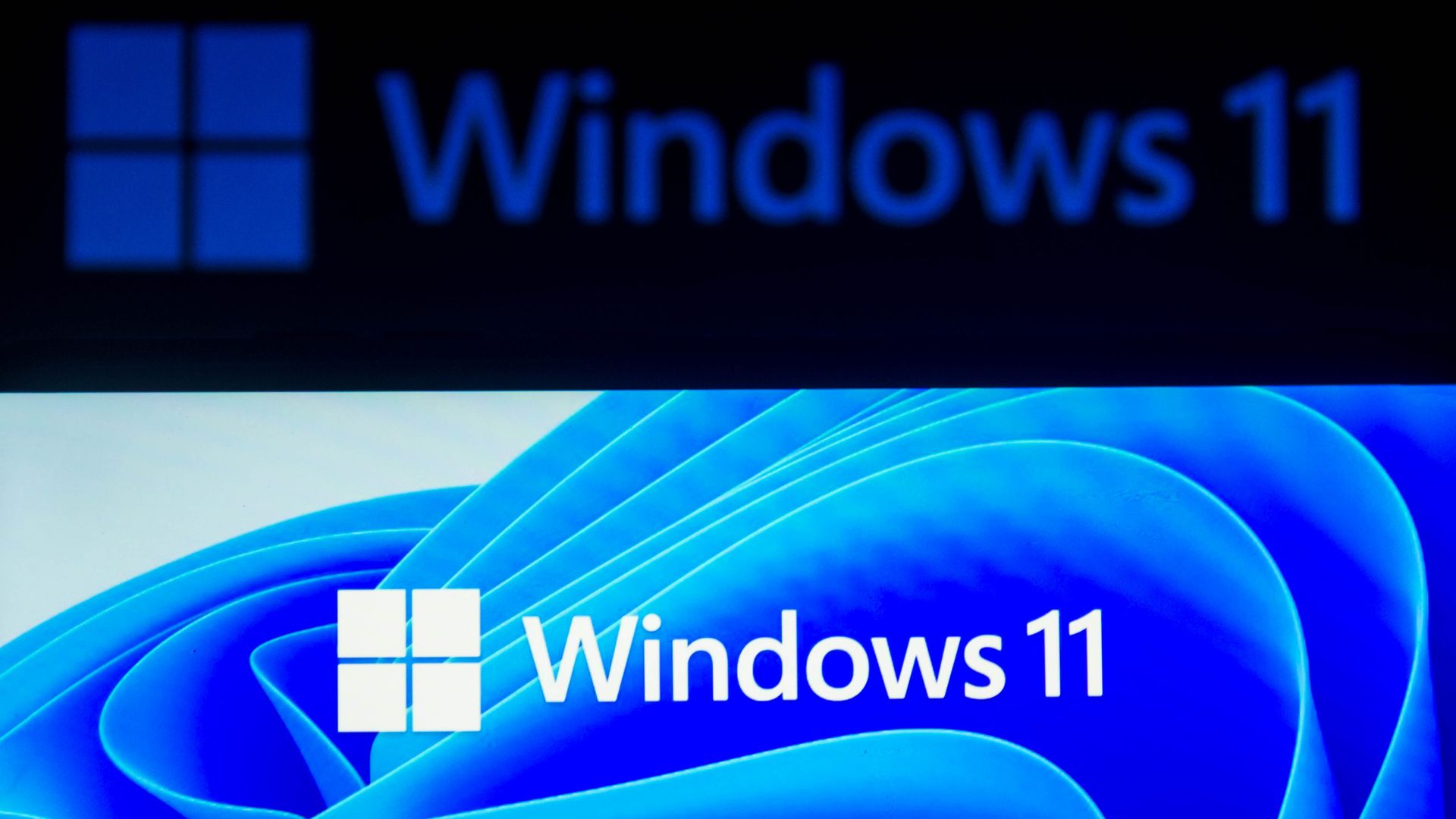 In this photo illustration the Windows 11 logo seen displayed on a smartphone. 