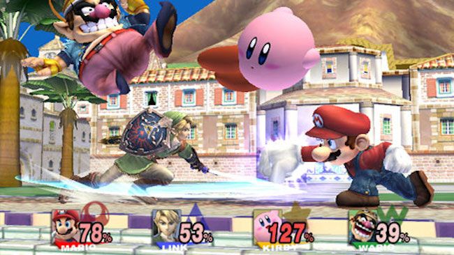 Fighting game screenshot showing Super Mario fighting Zelda's Link