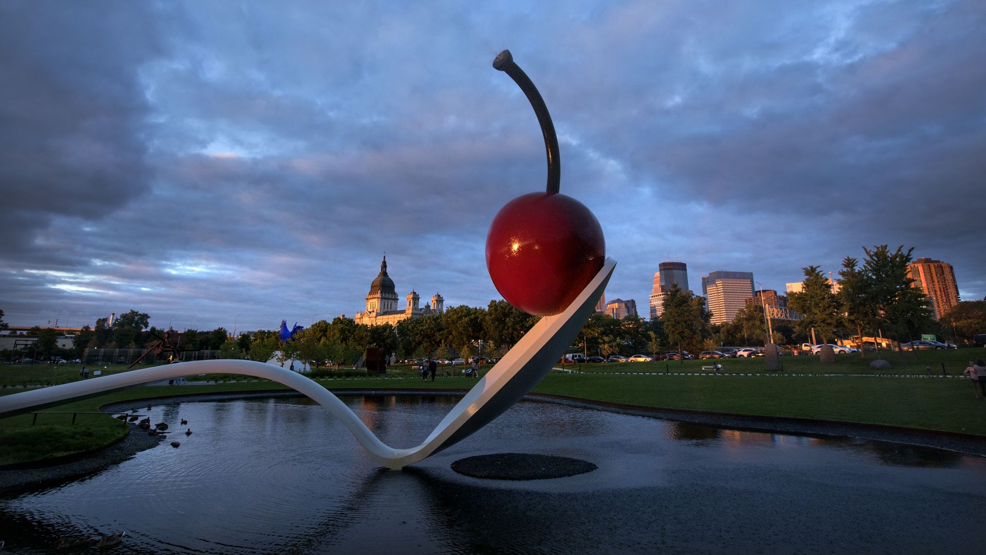 ictured is the sculpture Spoonbridge and Cherry, August 29, 2017, at the Minneapolis Sculpture Garden, designed by Claes Oldenburg and Coosje van Bruggen. [Spoonbridge and Cherry, 1985-1988 Aluminum, stainless steel, paint 354 x 618 x 162 in. Gift of Frederick R. Weisman in honor of his parents, Wil