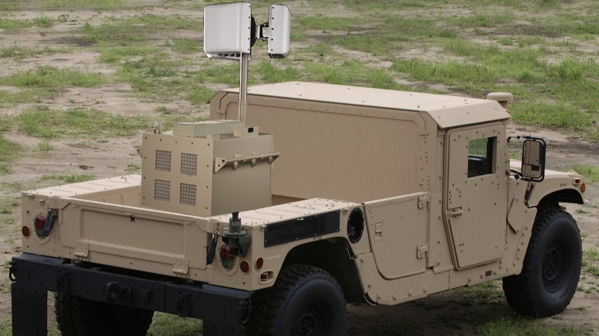 A rendering of a base station being transported on a military vehicle. 