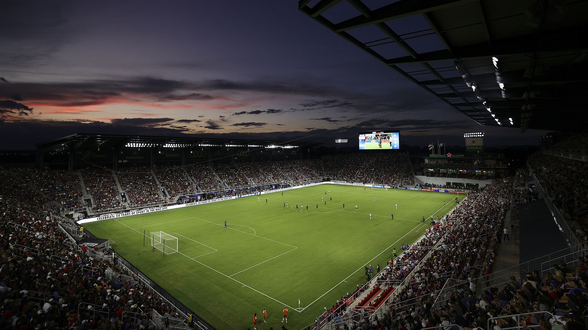 Audi Field shown at nighttime from above during a match