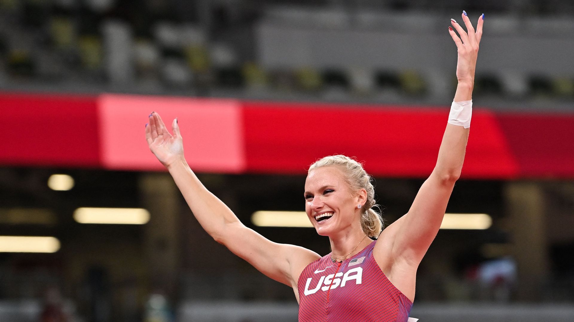 USA's Katie Nageotte celebrates after winning the women's pole vault final during the Tokyo 2020 Olympic Games at the Olympic Stadium in Tokyo on August 5, 2021