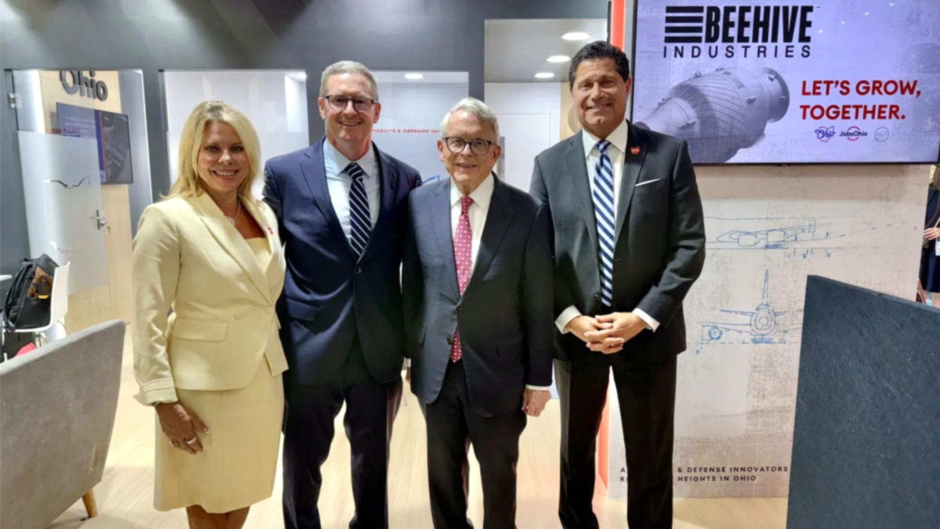 From left, Kimm Lauterbach, president and CEO of REDI Cincinnati; Gordie Follin of Beehive Industries; Ohio Gov. Mike DeWine; and J.P. Nauseef, president and CEO of JobsOhio, at the Farnborough International Airshow in the United Kingdom.