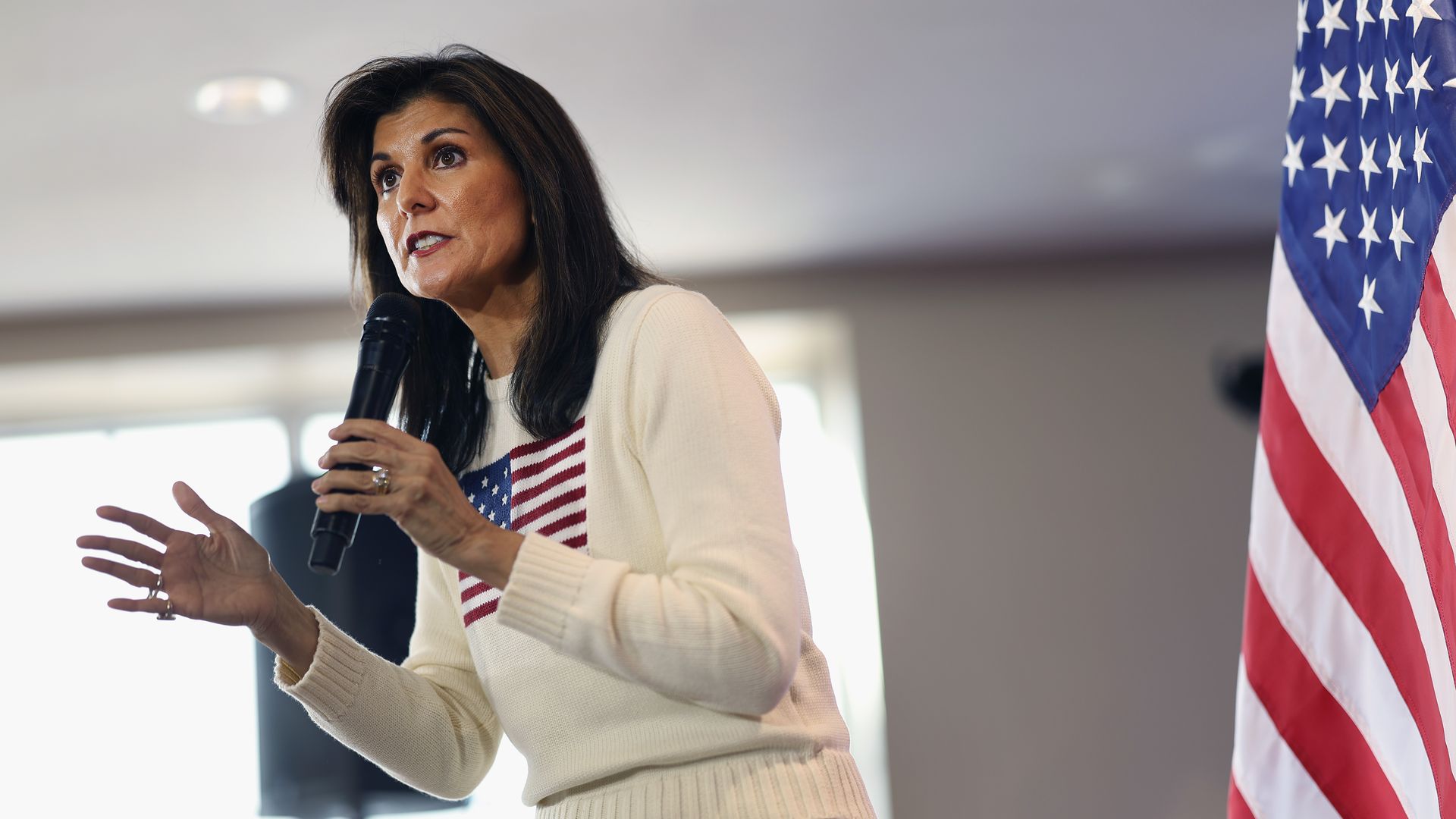Republican presidential candidate former U.N. Ambassador Nikki Haley addresses the crowd during a campaign stop at the Nevada Fairgrounds community building on December 18, 2023 in Nevada, Iowa.
