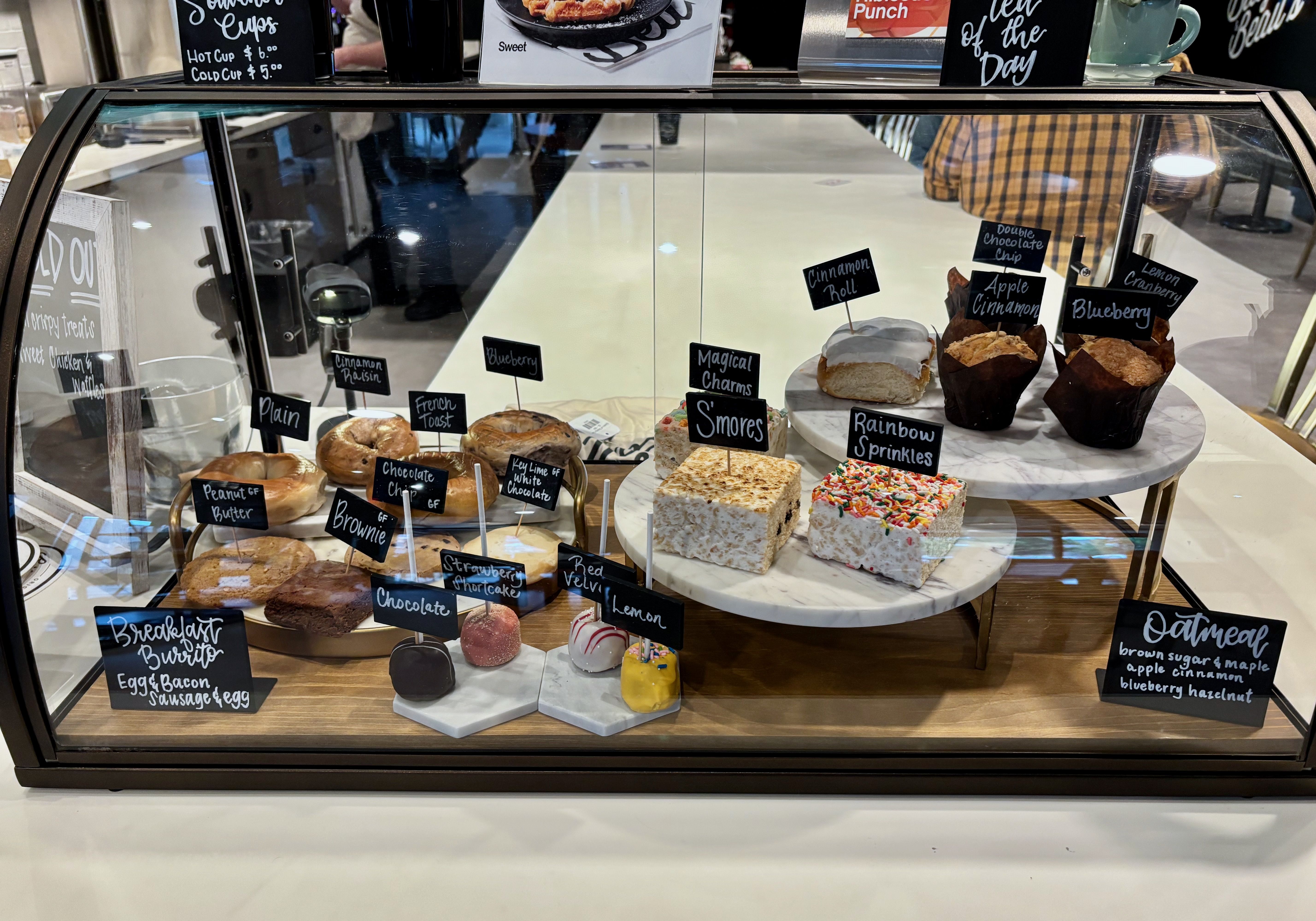 A display case full of desserts at the Bitty & Beau's ordering counter.