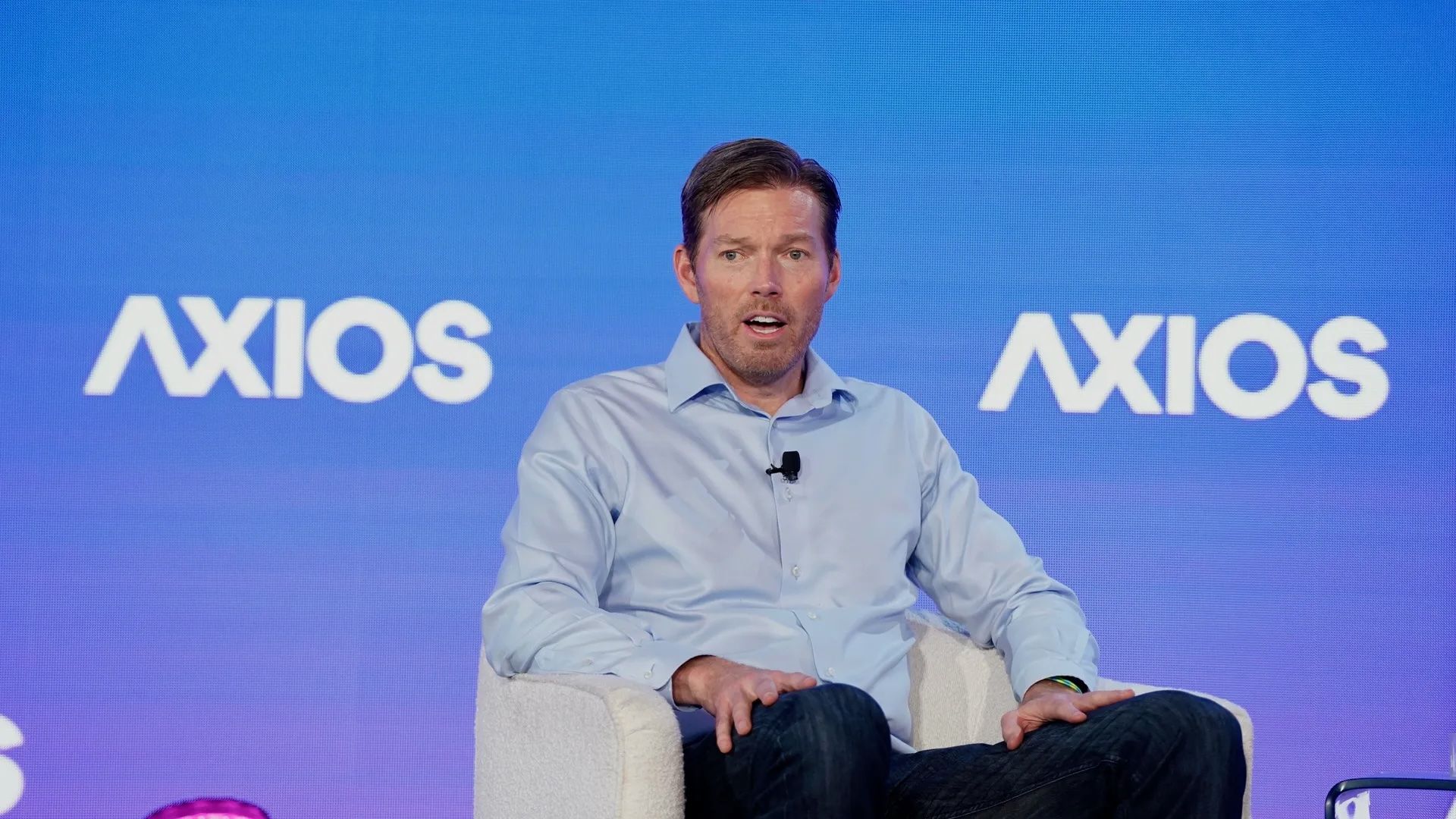 Scale AI CEO Jason Droege speaks at an Axios event in Washington in September. Photo: Ralph Alswang for Axios