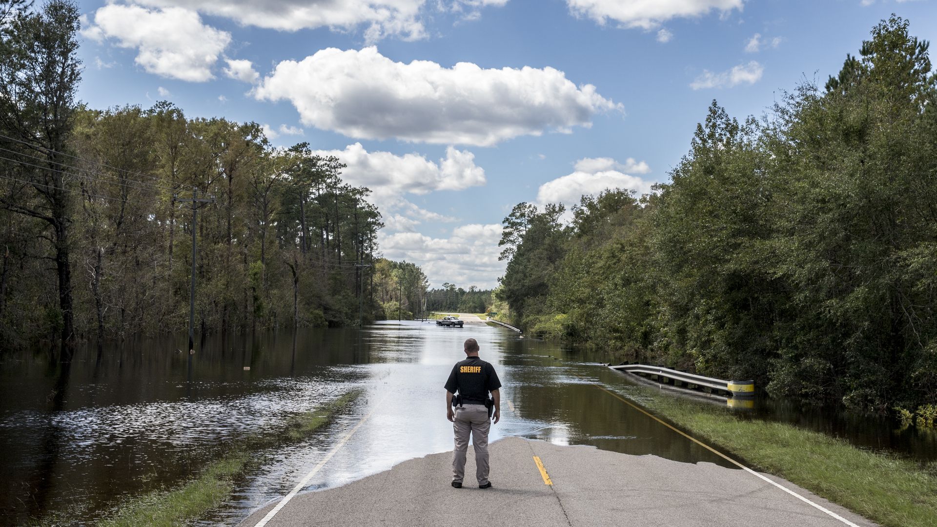 A road submerged under water.