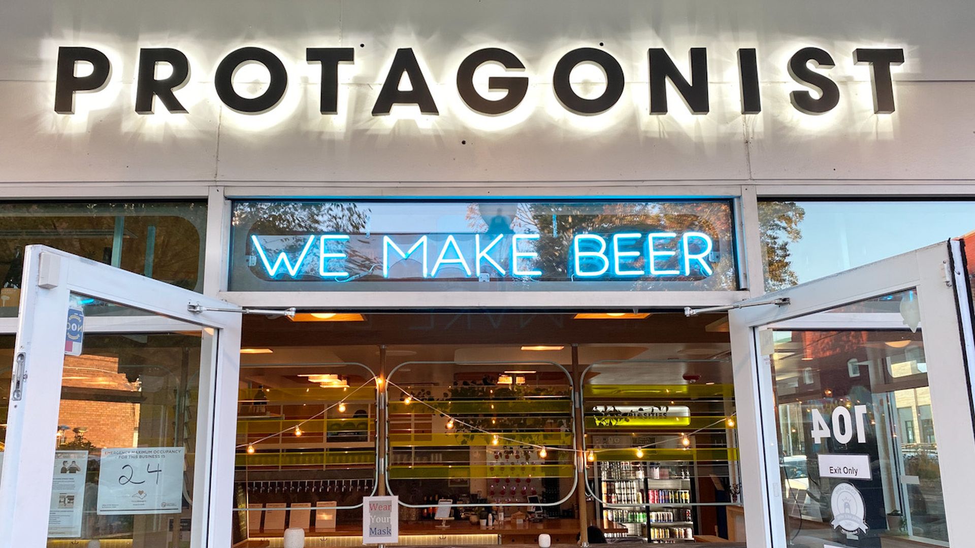 photo of protagonist brewery exterior in NoDa, with sign saying PROTAGONIST