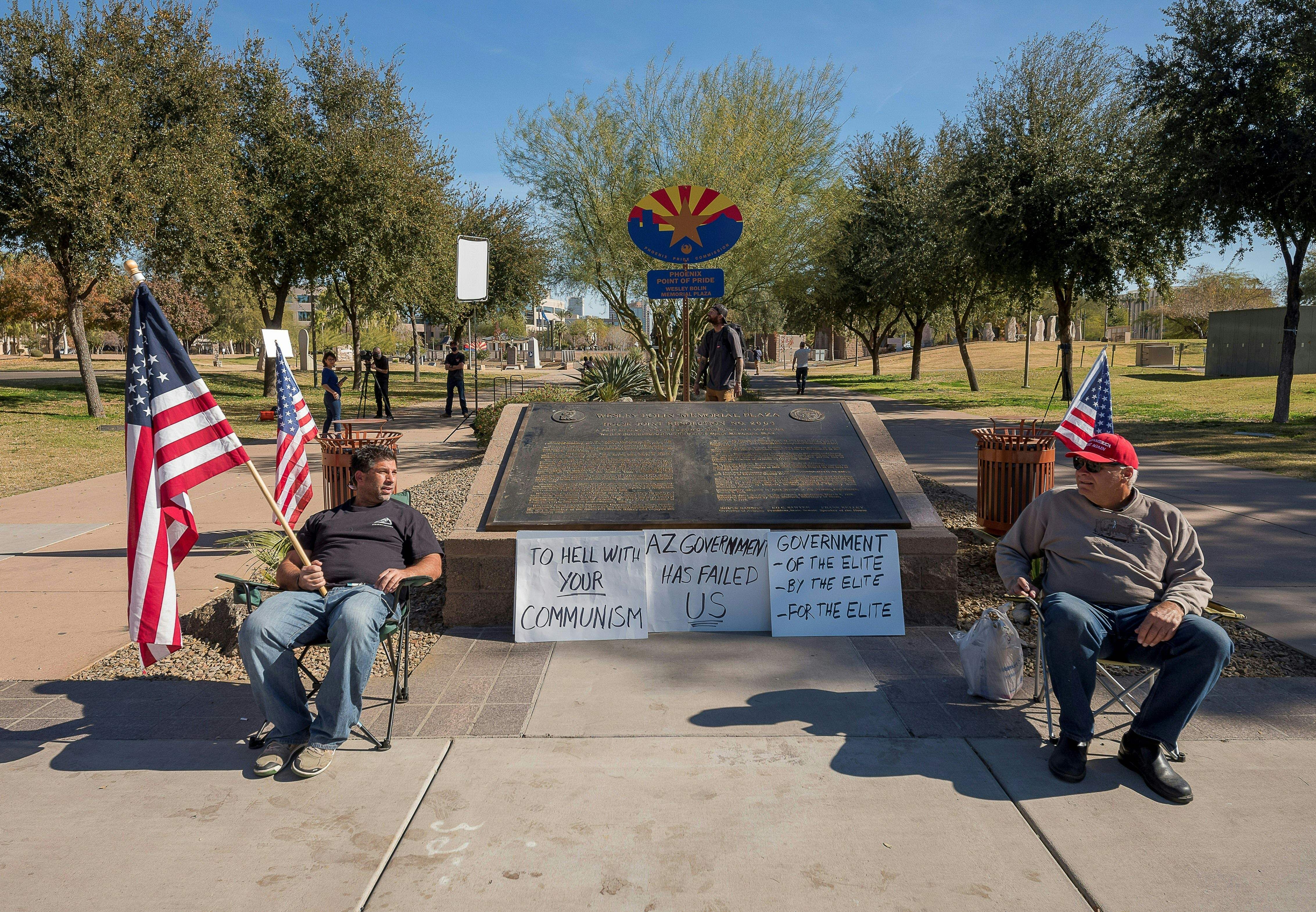 Trump supporters stand outside the Capitol Building in Phoenix, Arizona, on January 17