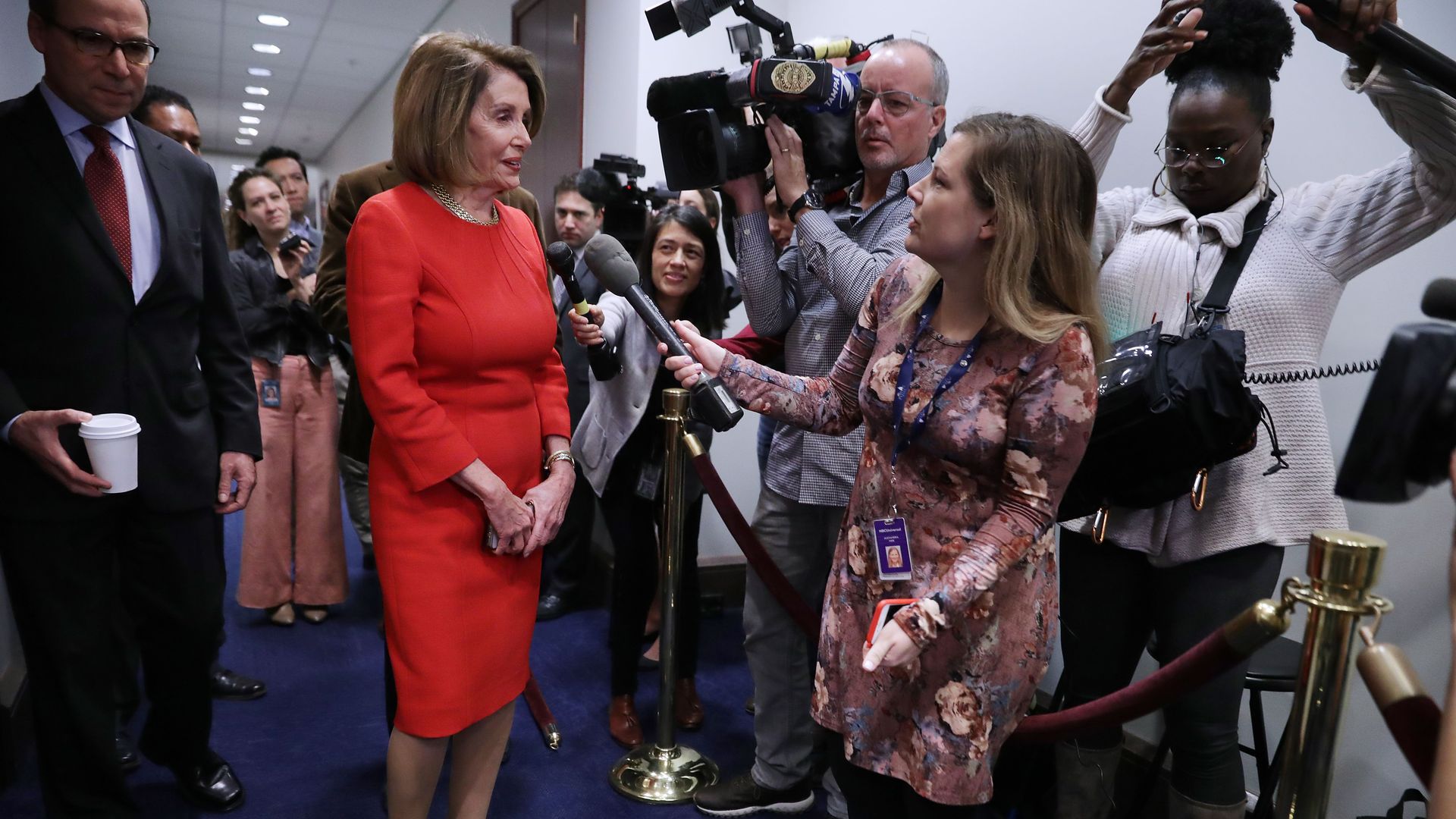 Nancy Pelosi being interviewed