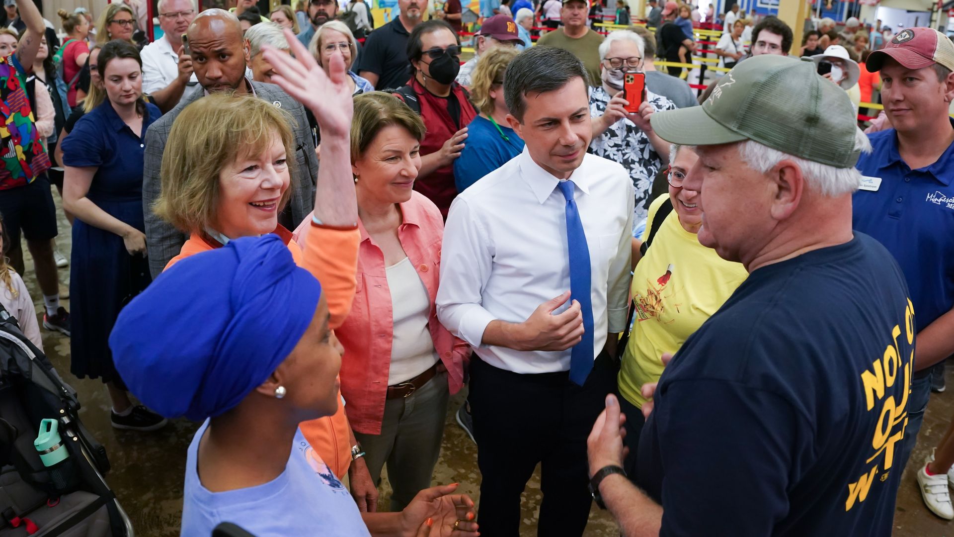 Transportation Secretary Pete Buttigieg greeted Governor Tim Walz as he toured with Minnesota State Fair with Rep. Ilhan Omar, Sen. Tina Smith and Sen. Amy Klobuchar Thursday, Aug. 25, 2022, Falcon Heights, Minn. 