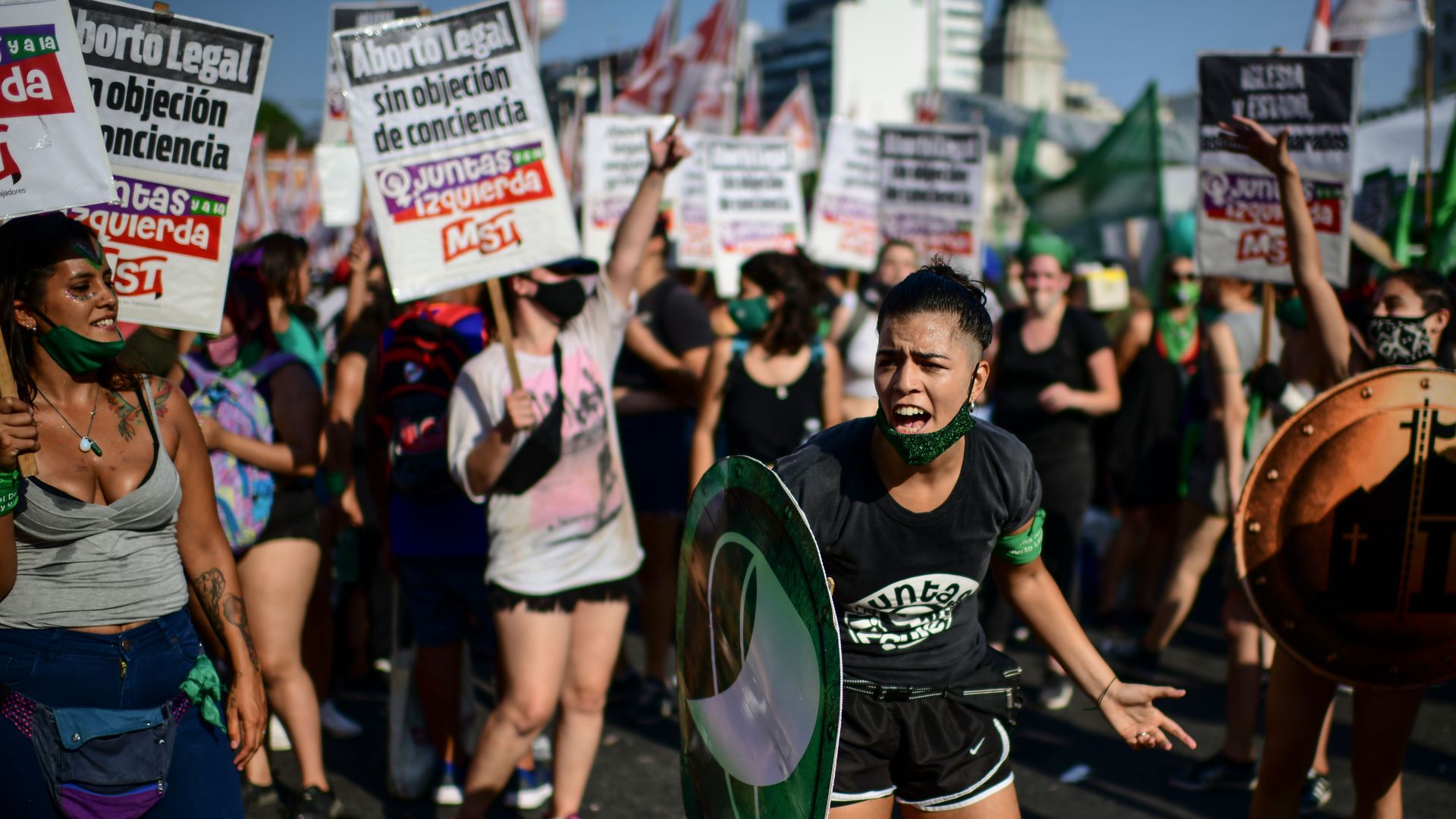  Abortion rights activists demonstrate outside the Congress as senators debate a landmark bill on whether to legalize abortion in Buenos Aires, on December 29