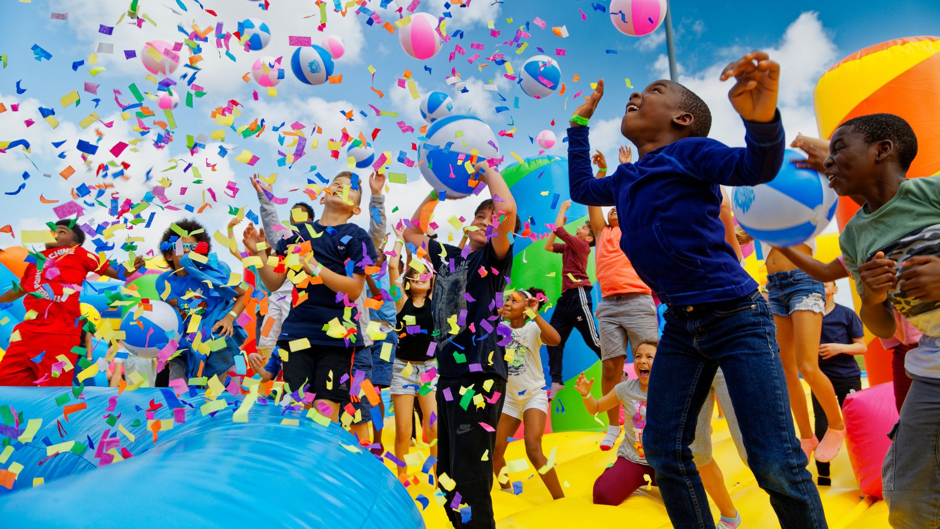 Children enjoying part of the Big Bounce America house