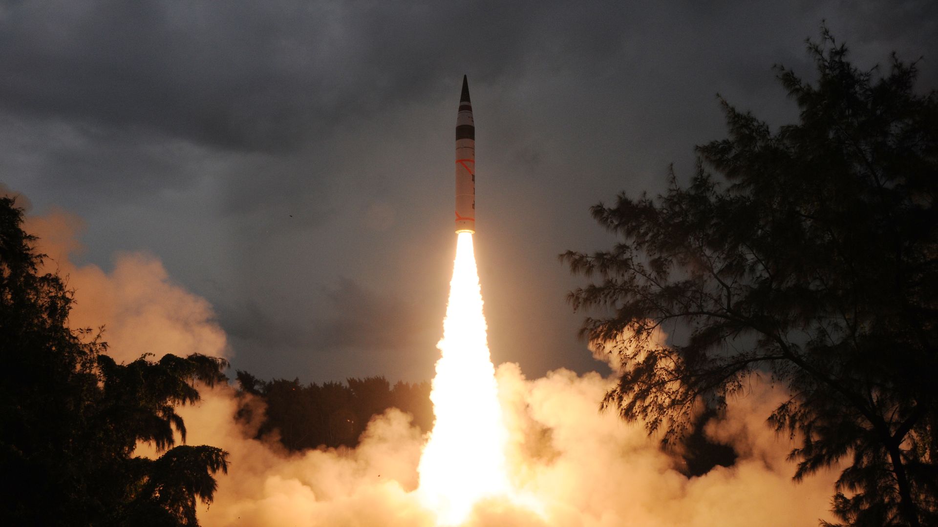 Image of a nuclear-capable Indian missile being test-launched.