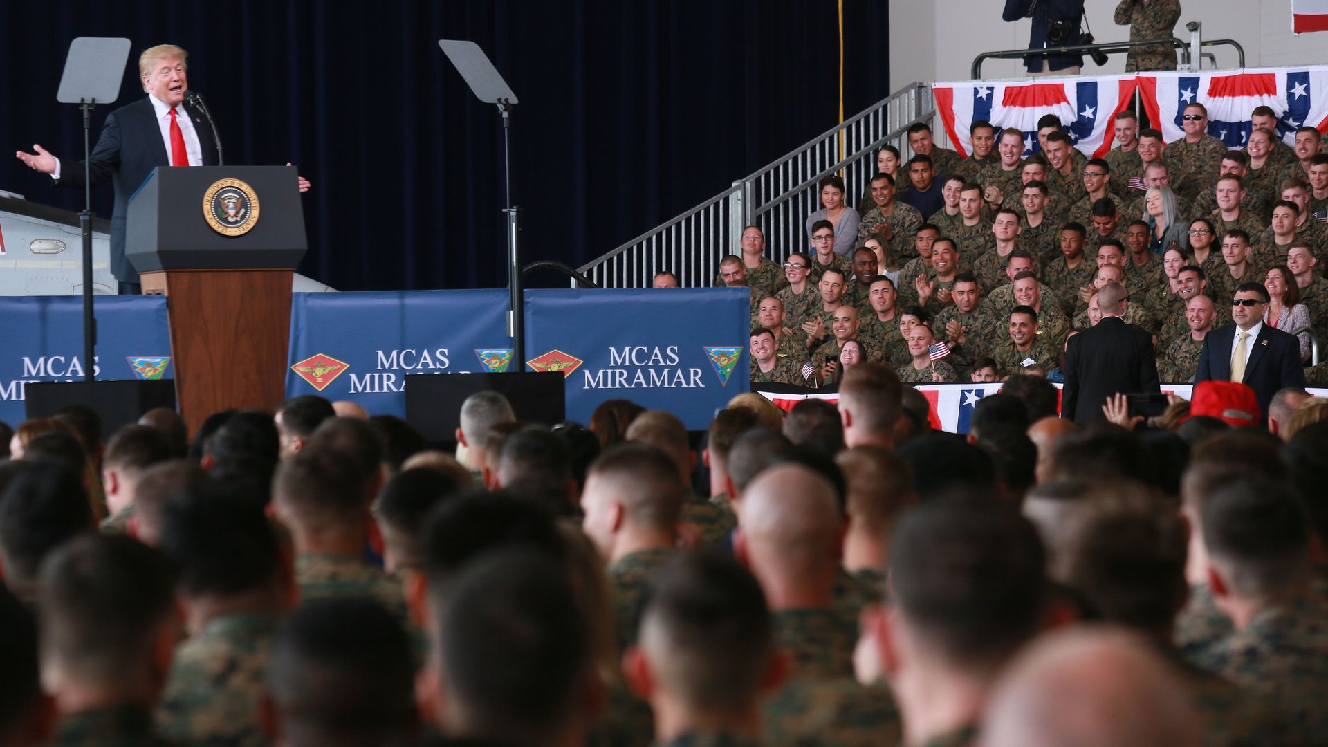 President Trump talks to troops.