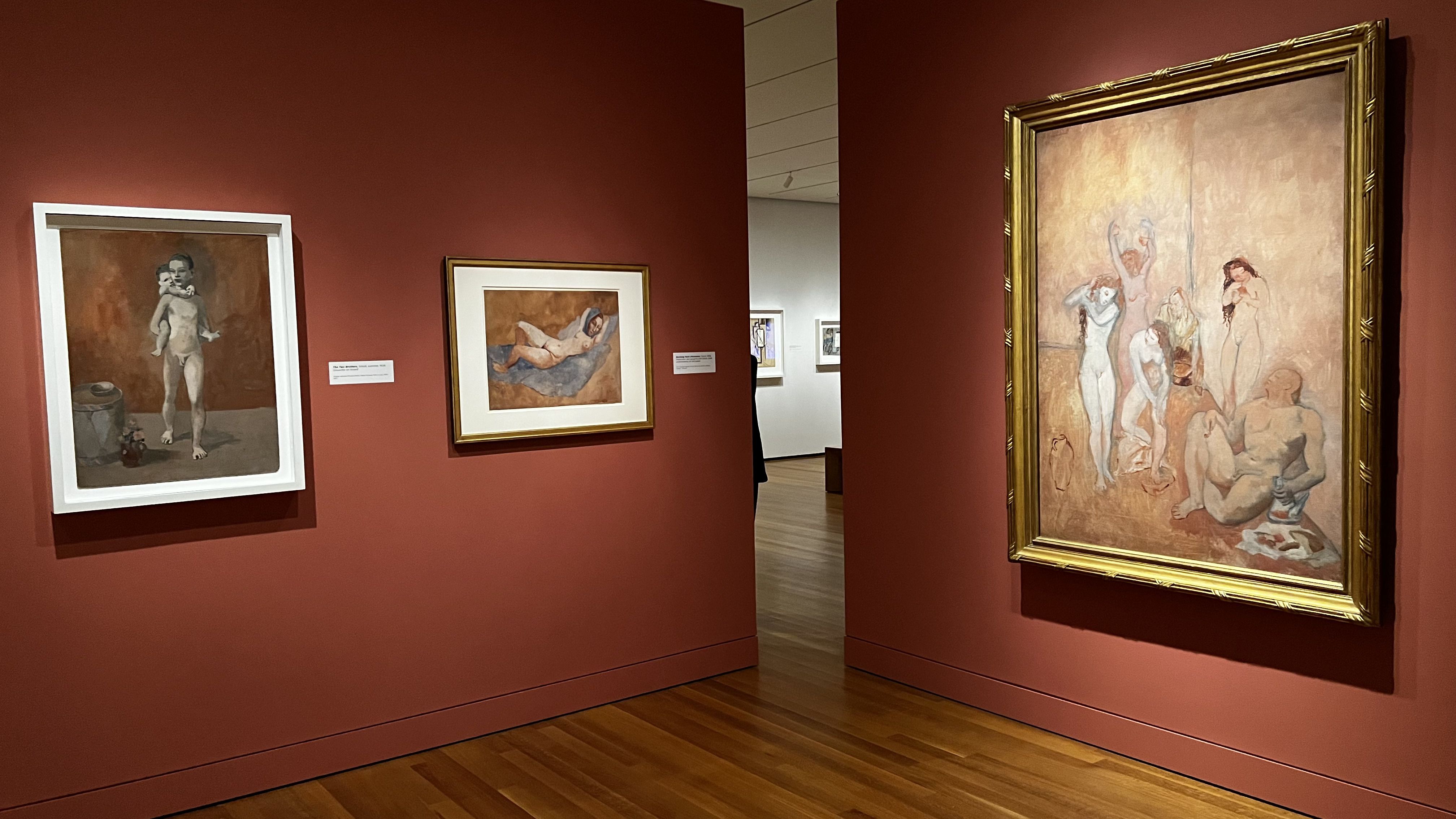 Wall featuring paintings from Pablo Picasso inside and exhibit space. 