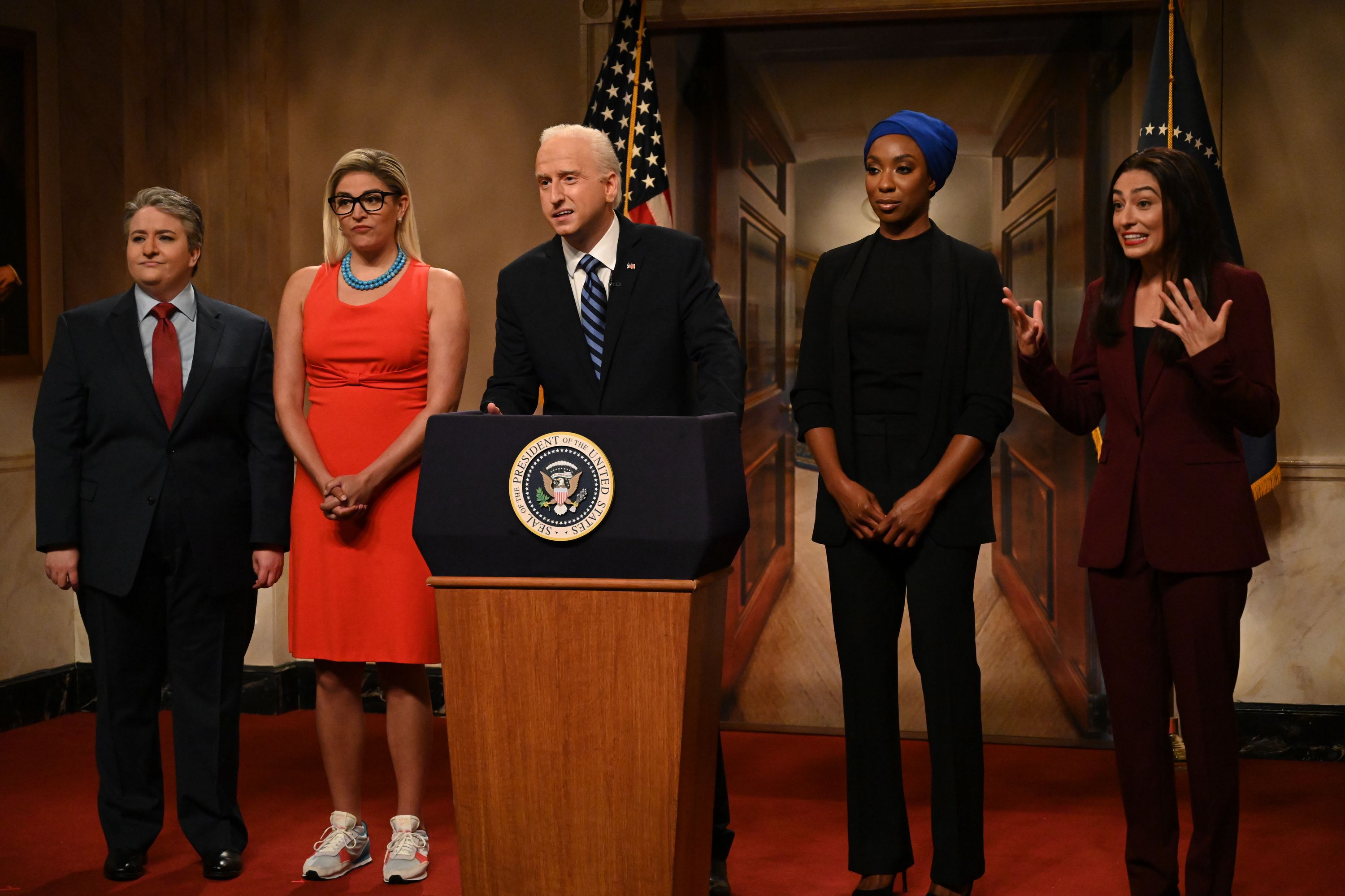 A group of people on stage. 