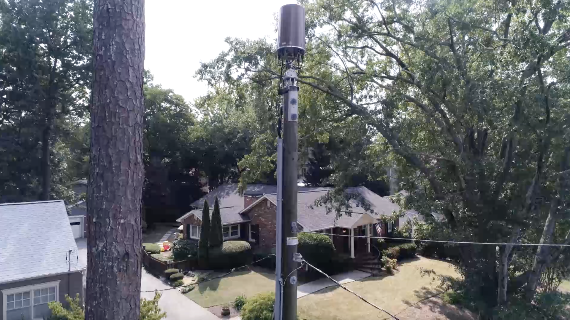 In this picture, a house in a small Georgia neighborhood is pictured with 5G small cell technology