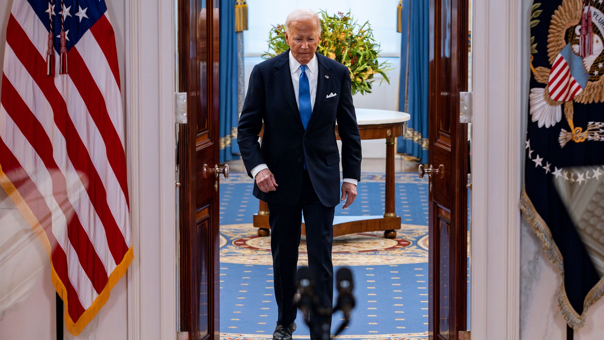 US President Joe Biden arrives in the Cross Hall of the White House in Washington, DC, US, on Monday, July 1, 2024.