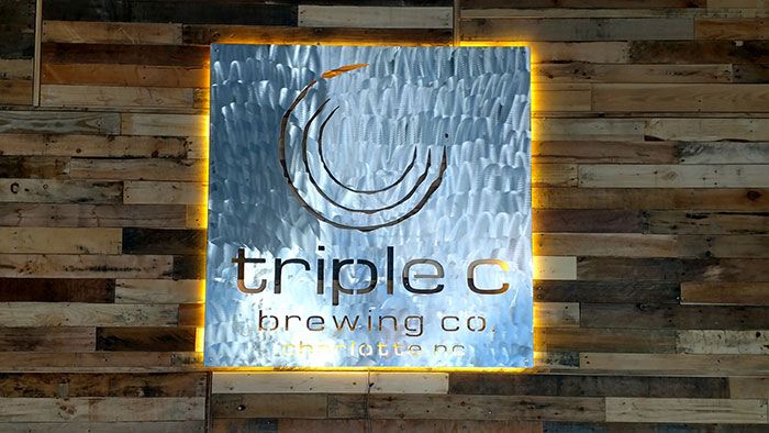 triple-c-brushed-aluminum-sign-inside