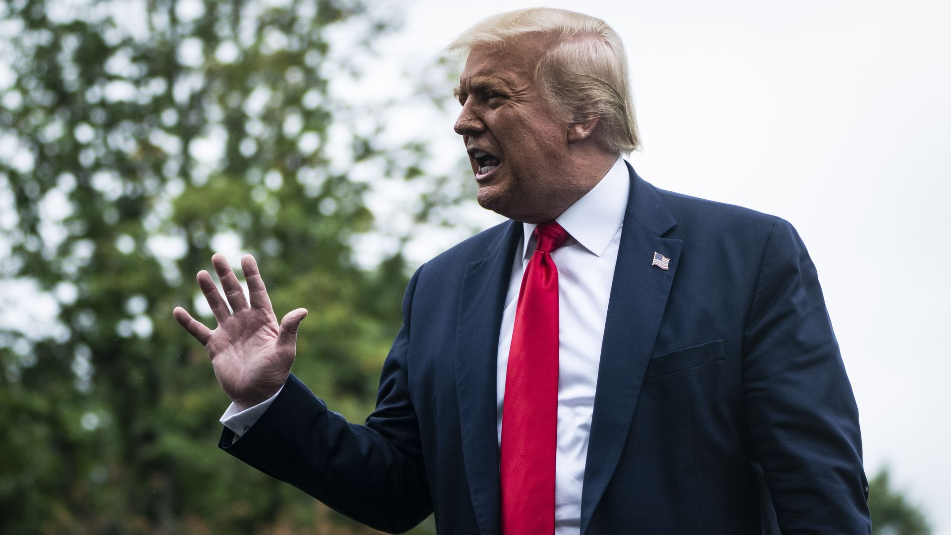 President Trump speaking to reporters on South Lawn in July.