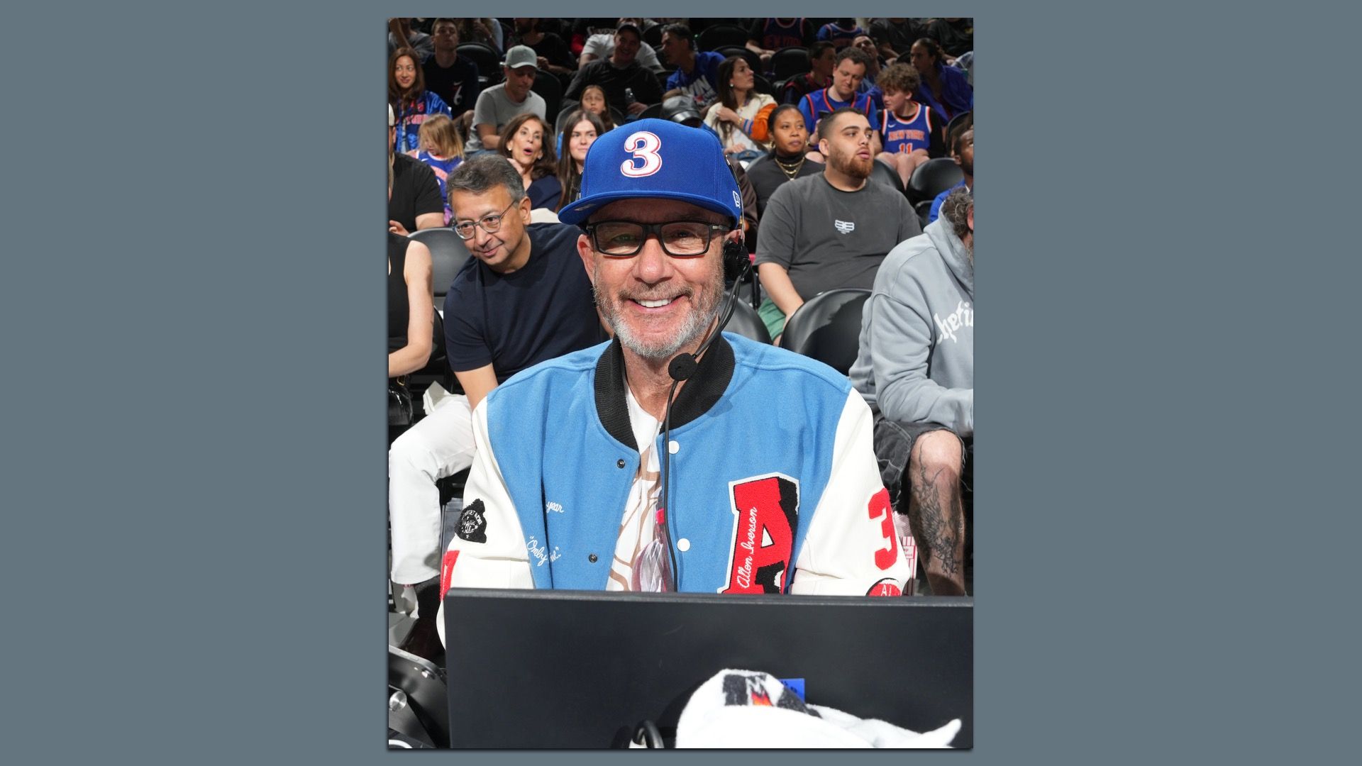 Philadelphia 76ers PA announcer Matt Cord smiles during a playoff game against the New York Knicks.