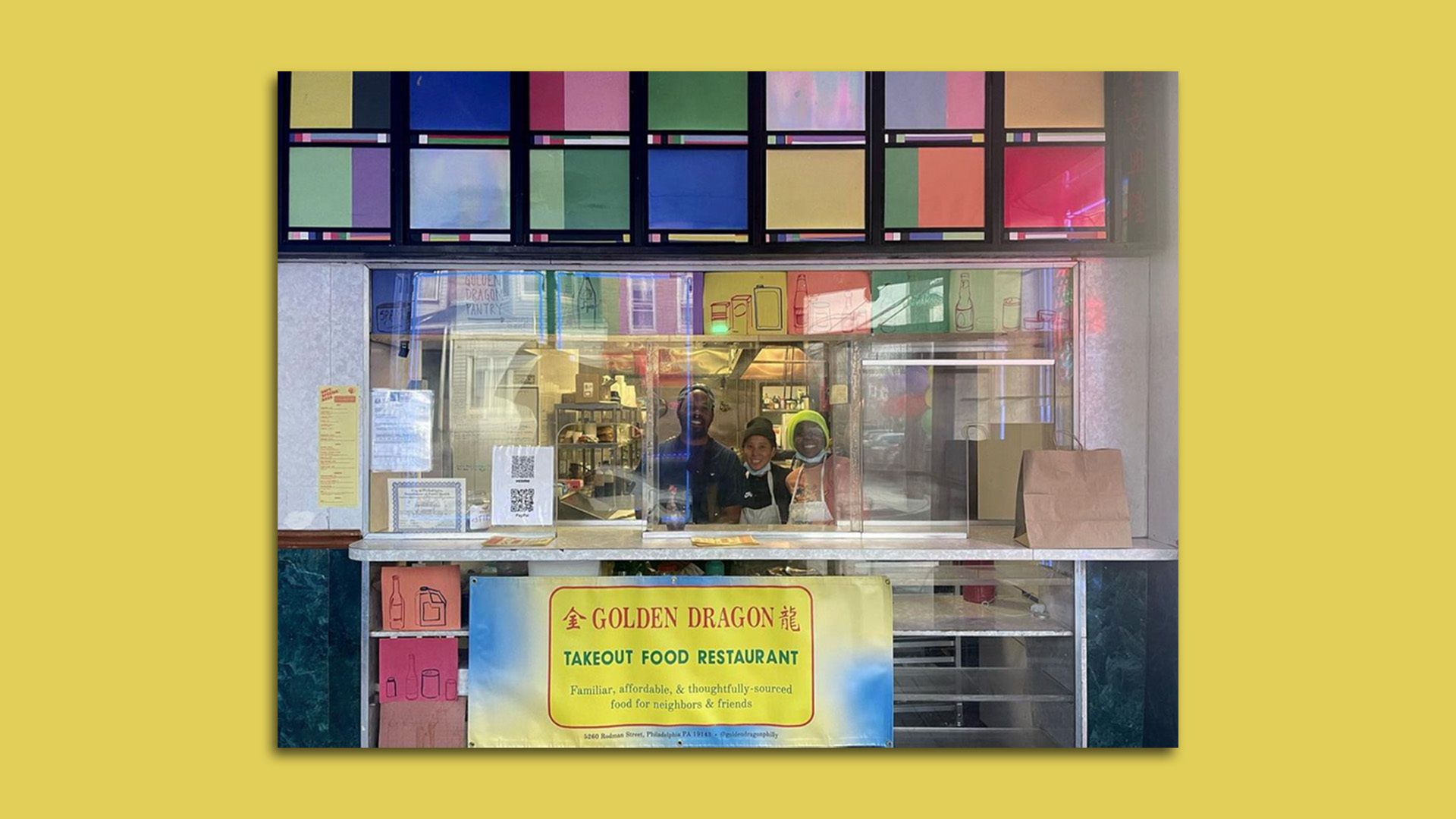 Workers inside the Golden Dragon takeout restaurant in West Philadelphia.  