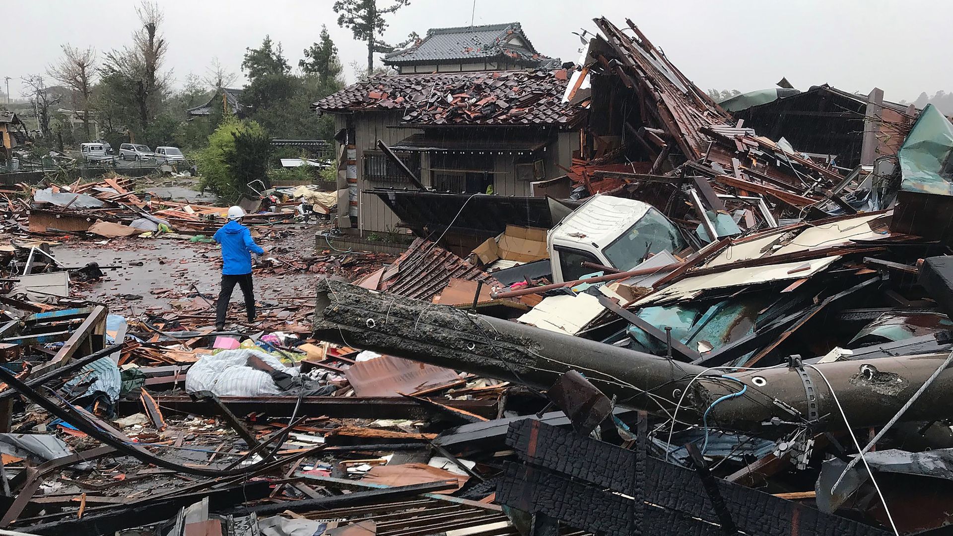 Damaged houses caused by weather patterns from Typhoon Hagibis in Ichihara, Chiba prefecture.