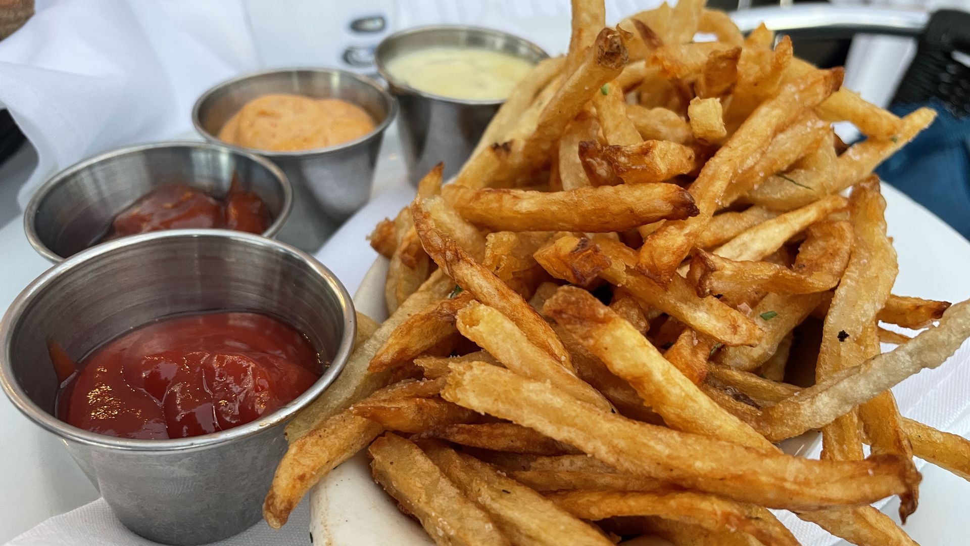 A plate of duck frites with four dipping sauces from Des Moines' Django restaurant.