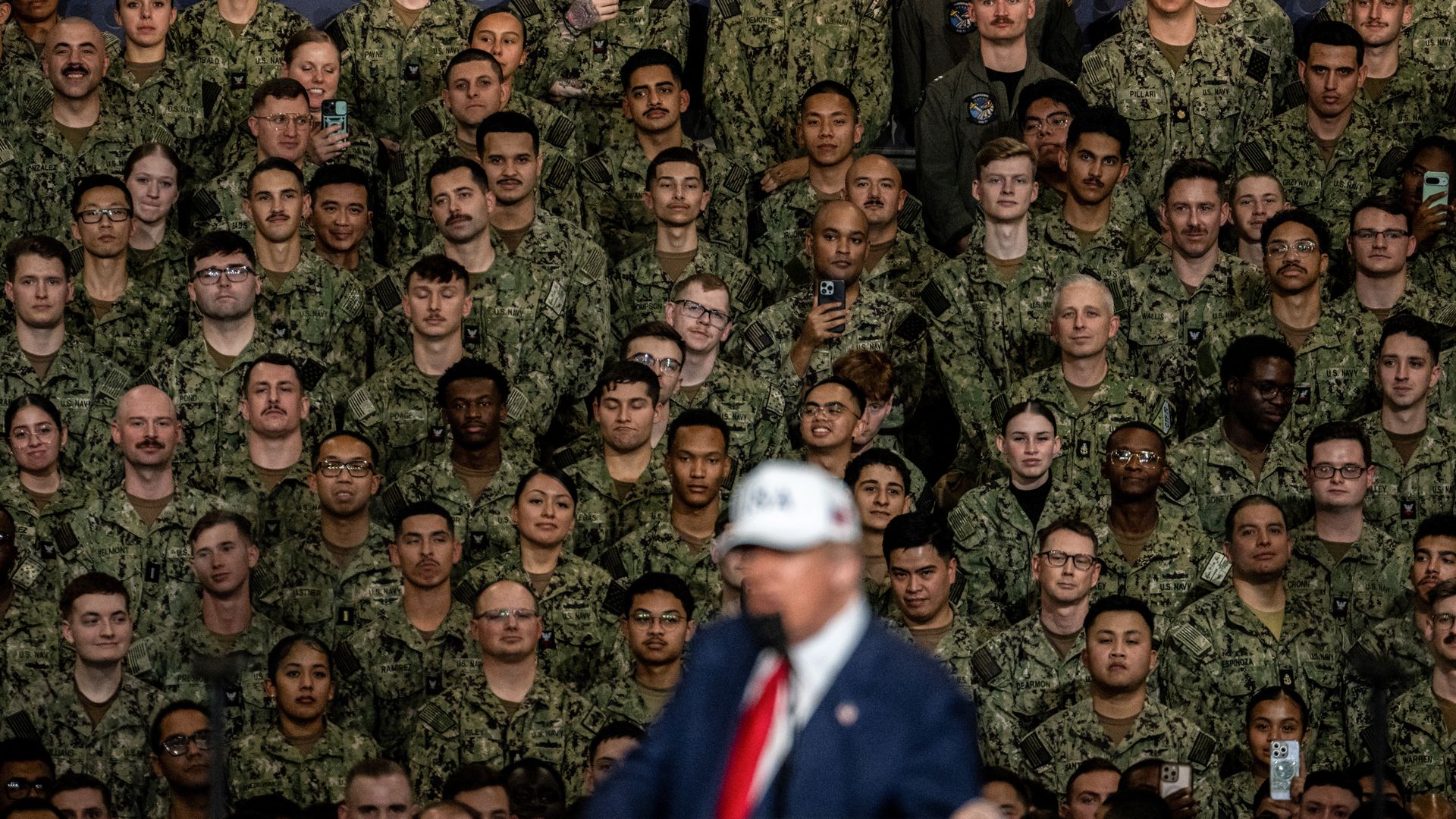  US President Donald Trump delivers a speech to US Navy personnel on board the US Navy's USS George Washington aircraft carrier at the US naval base in Yokosuka on October 28, 2025. (Photo by Philip FONG / AFP) (Photo by PHILIP FONG/AFP via Getty Images)