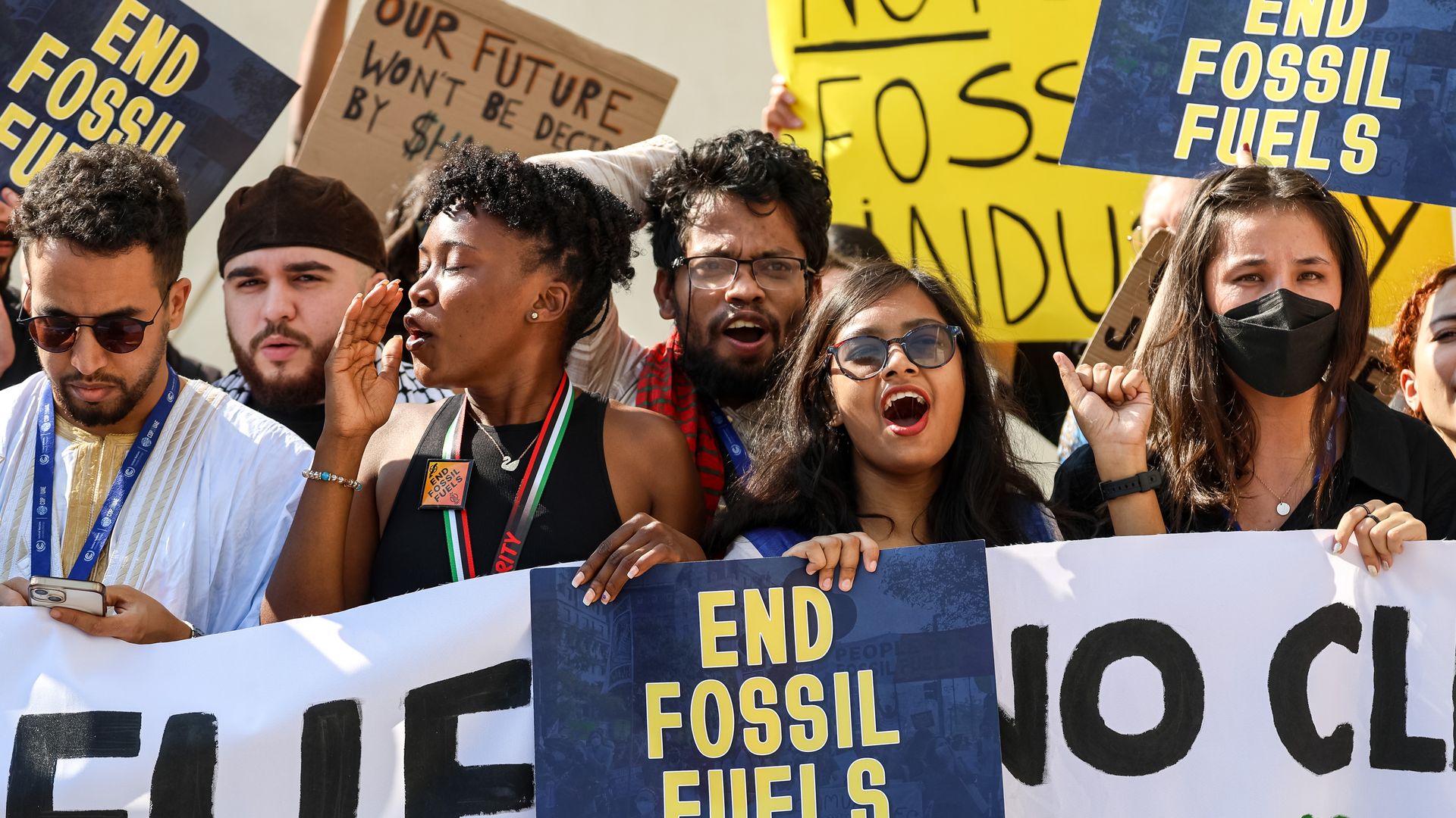 Youth from Fridays for Future organization stage a protest calling to cease fires and end fossil fuels in the conference venue, Blue Zone during the COP28, UN Climate Change Conference