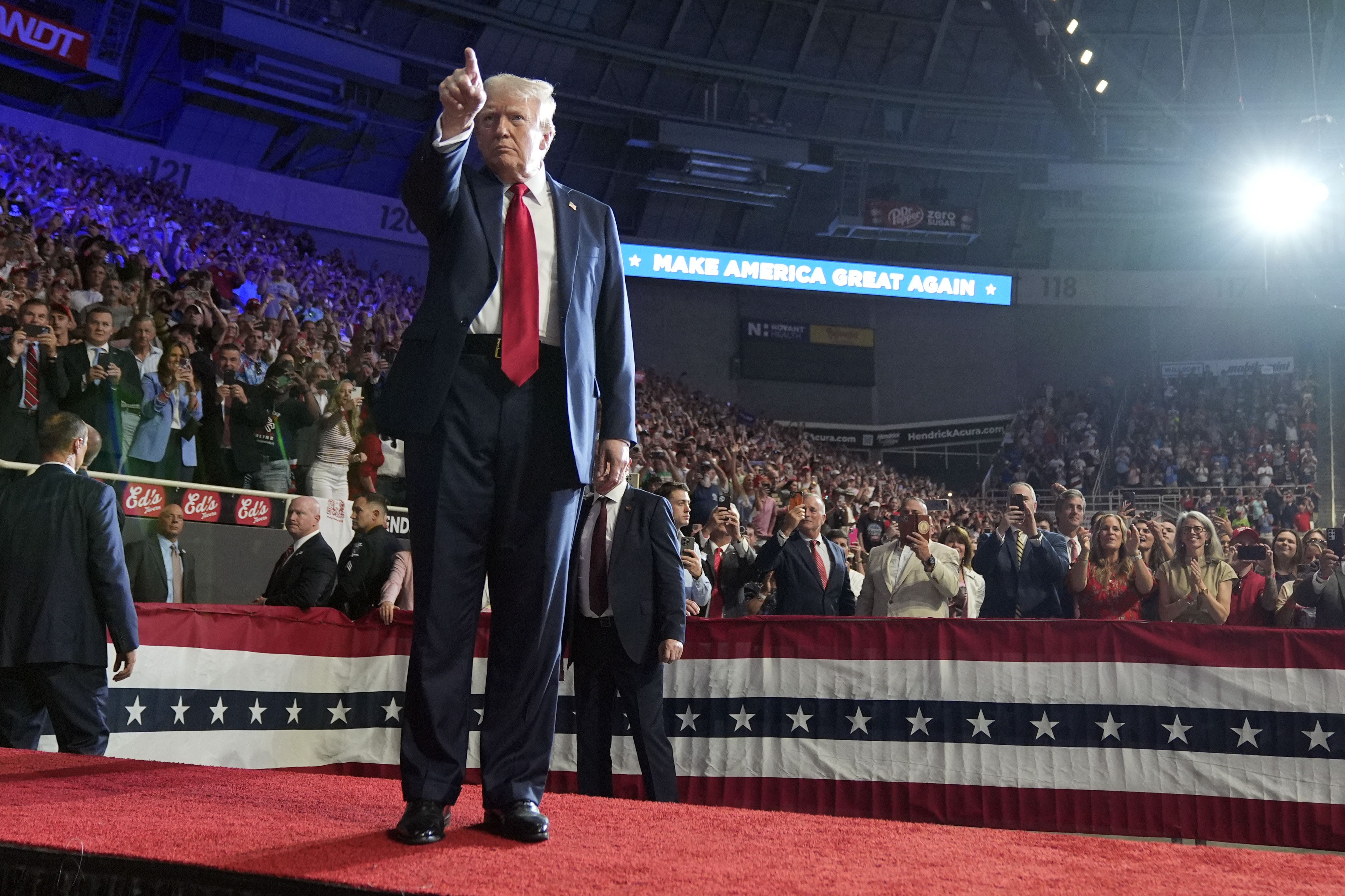 Former President Donald Trump arrives to speak at a campaign rally in Charlotte yesterday.