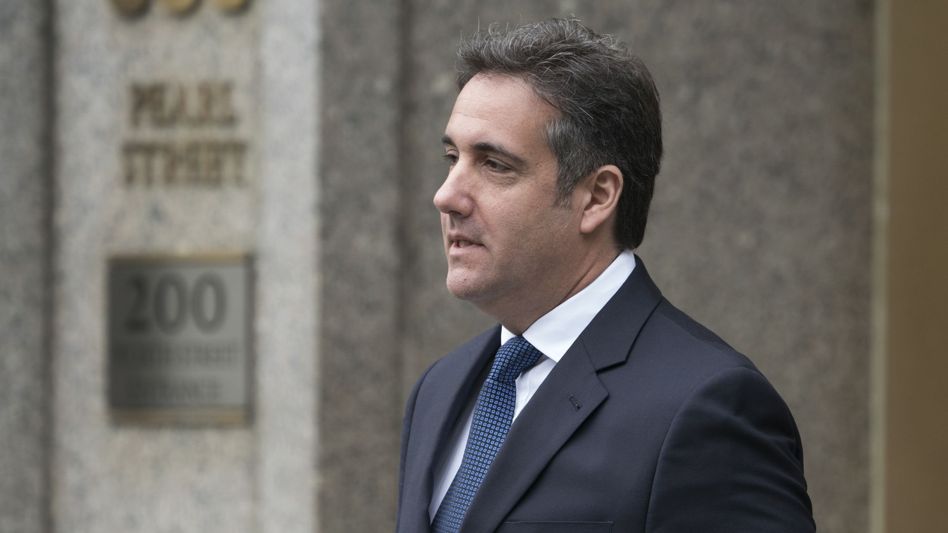Michael Cohen looks tired and surprised.