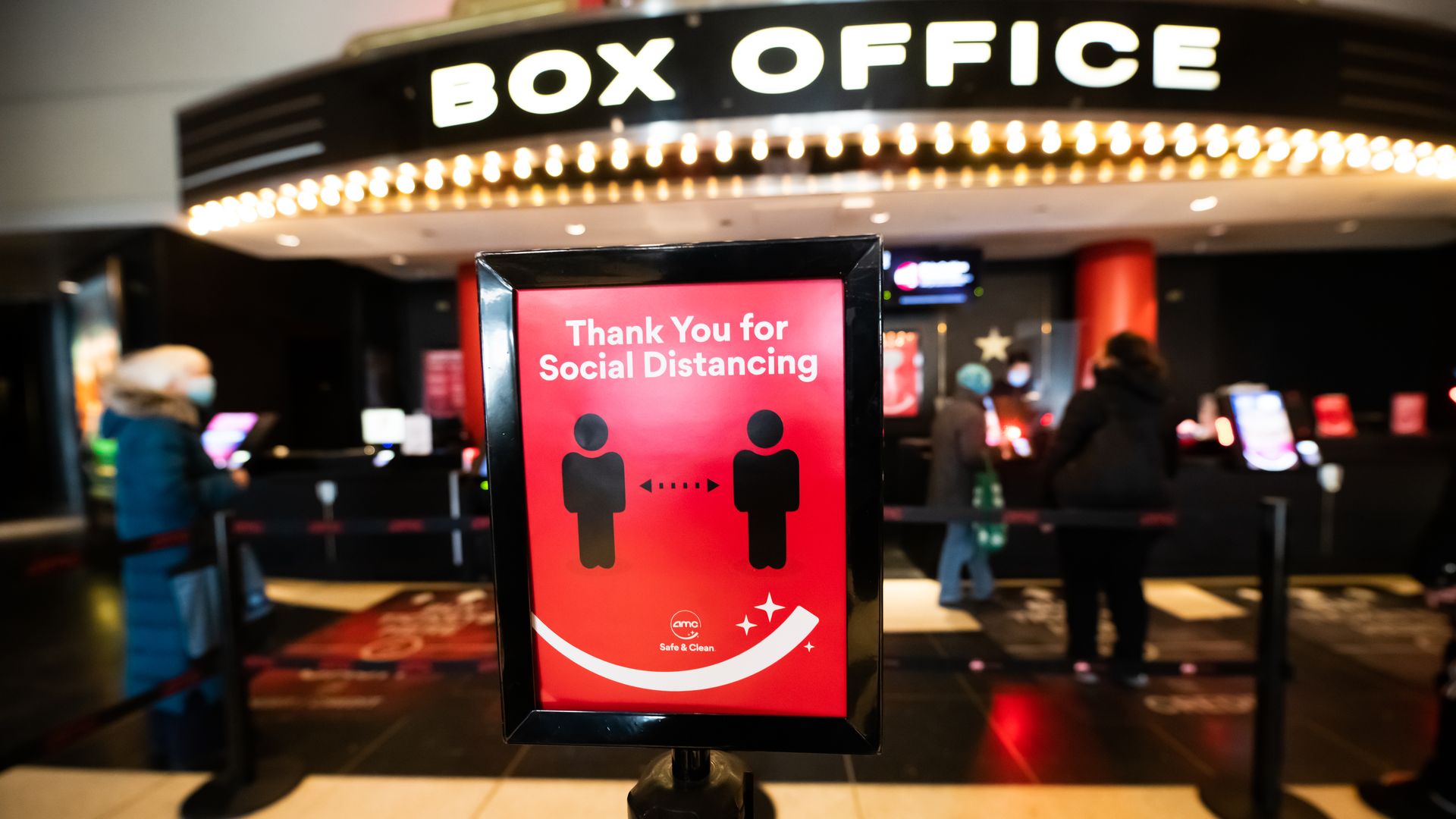 A sign that reads, "Thank you for social distancing" is seen by the box office at AMC Lincoln Square 13 on March 05, 2021 in New York City. 