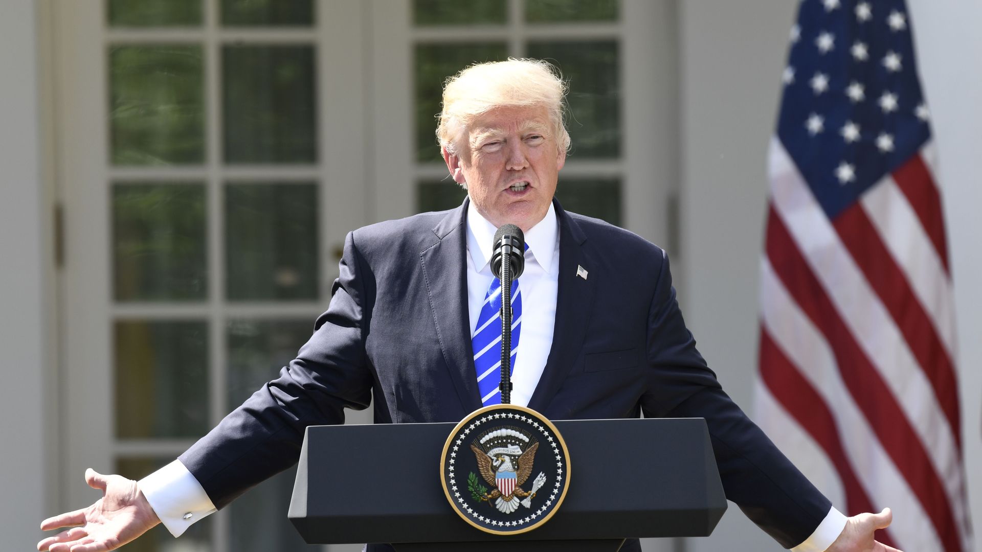 Trump speaking at a press conference