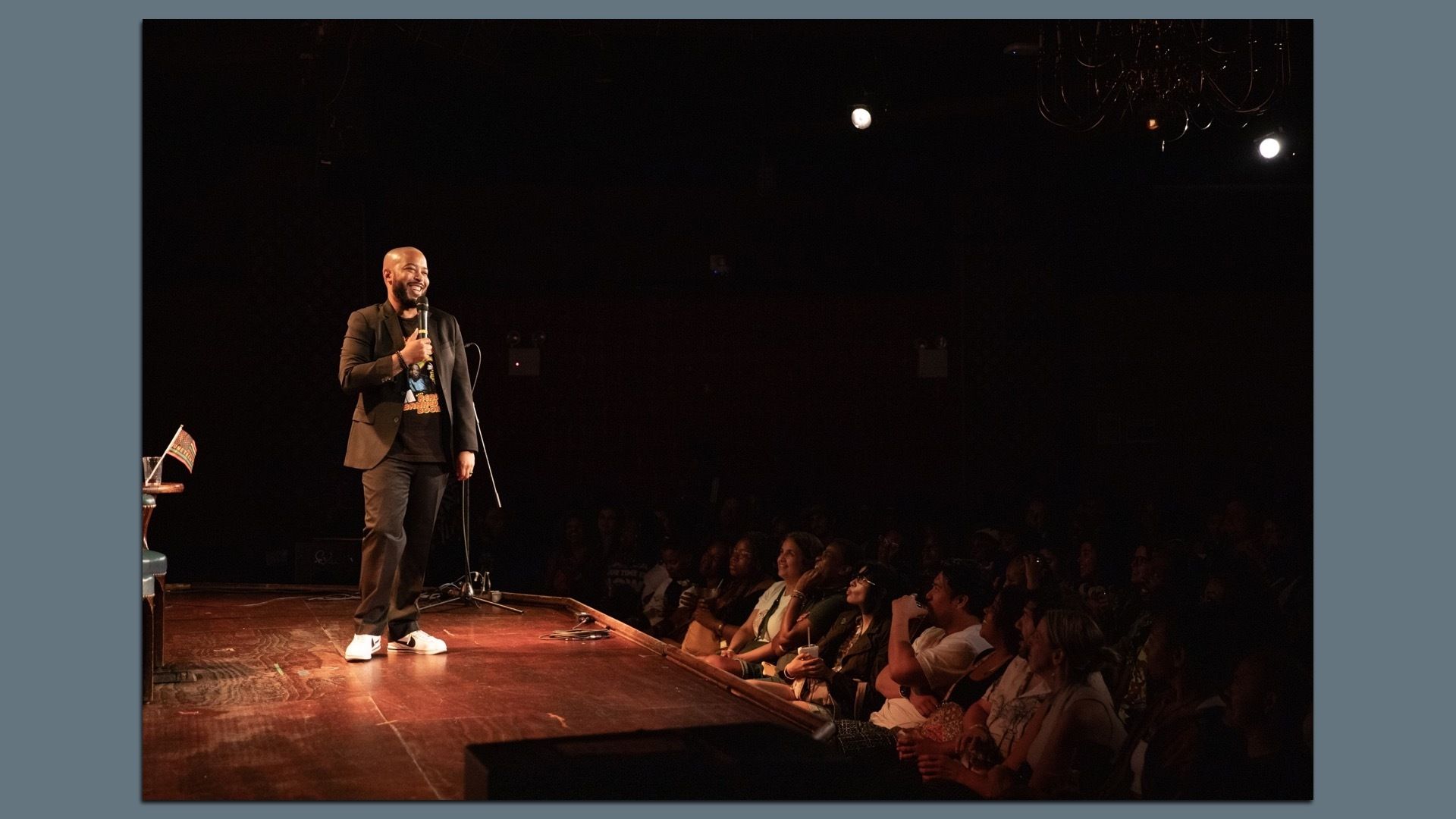 Philadelphia comedian Brandon Collins on stage at a past "Drunk Black History" event 