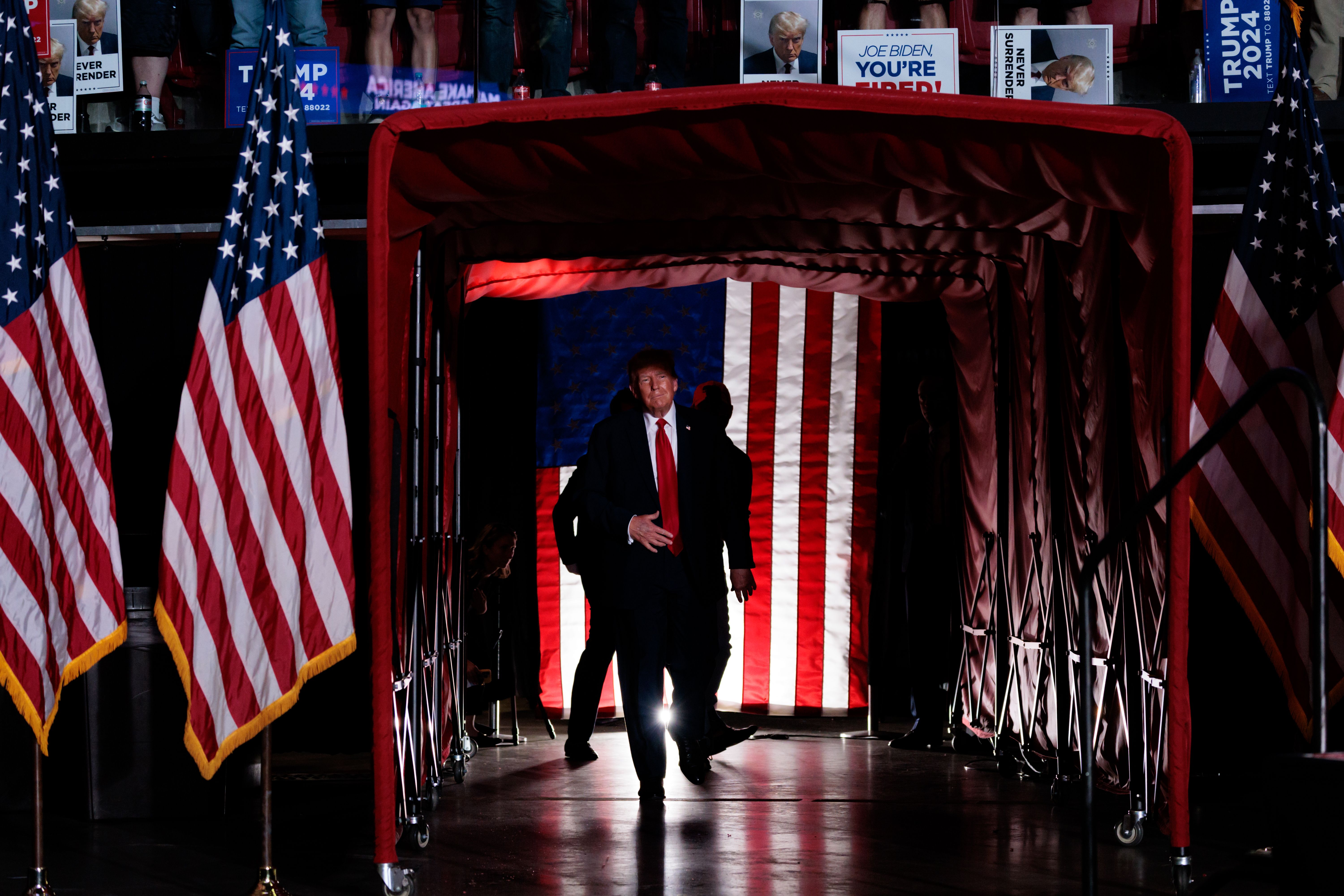 Former President Trump walks out during a campaign event at Temple University in Philadelphia on Saturday.