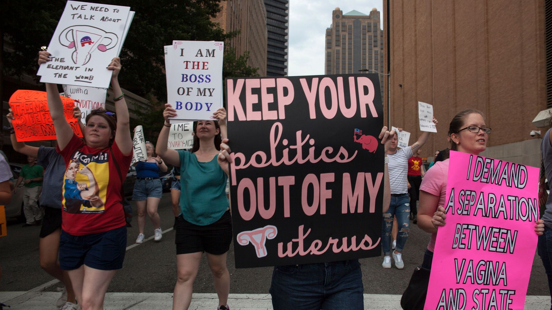 Protestors who support abortion rights with signs