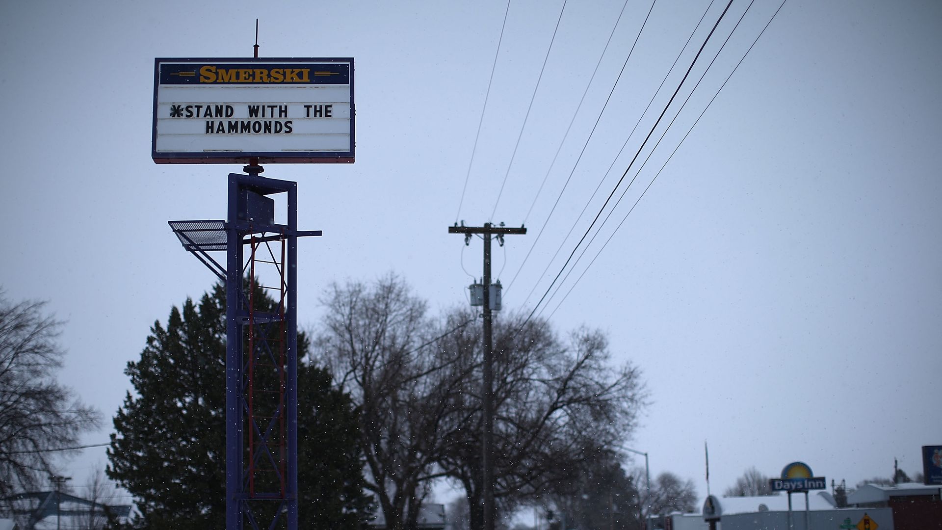 A sign that reads "*Stand with the Hammonds"