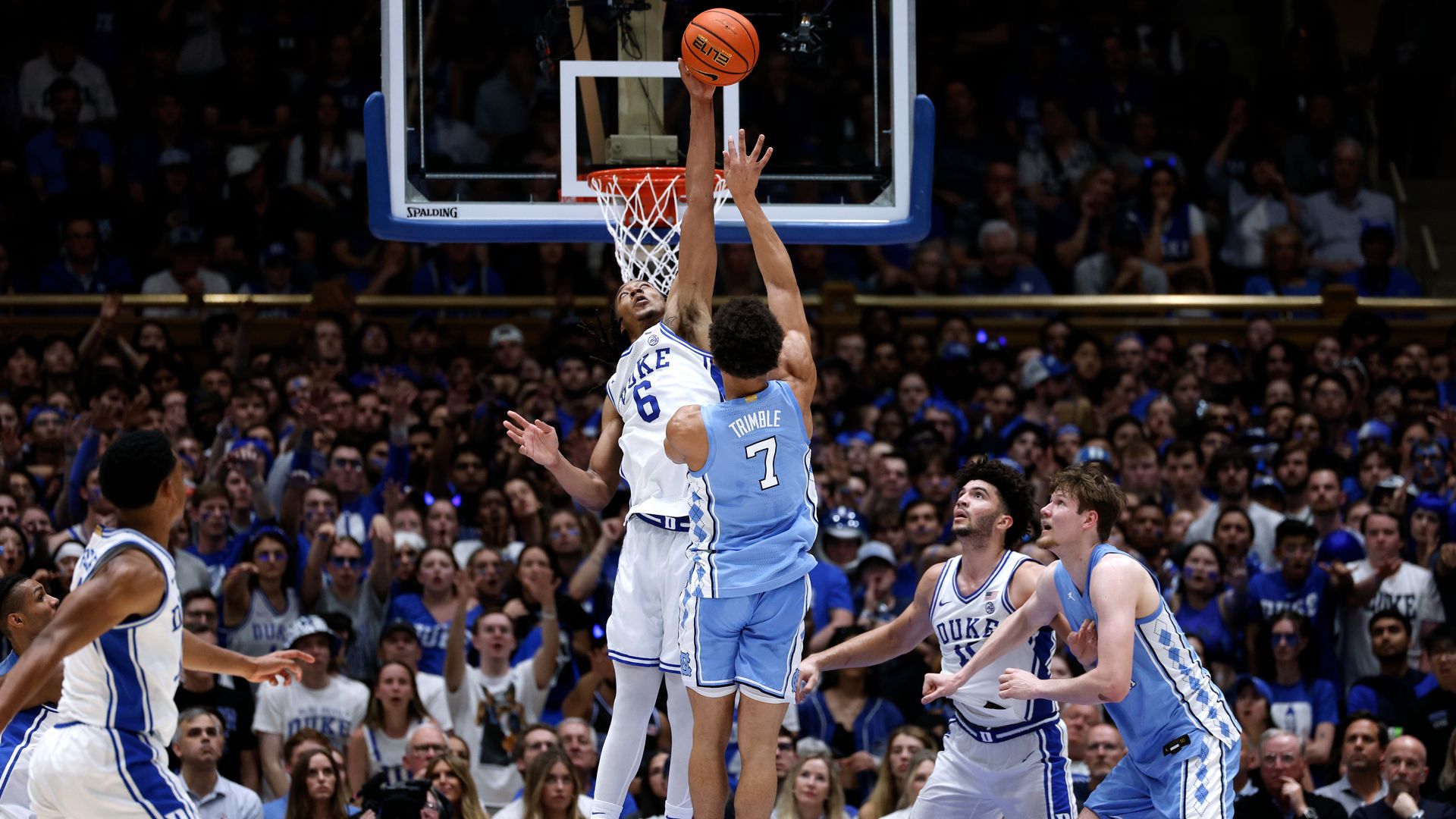 Maliq Brown #6 of the Duke Blue Devils blocks a shot by Seth Trimble #7 of the North Carolina Tar Heels in the first half at Cameron Indoor Stadium on March 7, 2026 in Durham, North Carolina. 