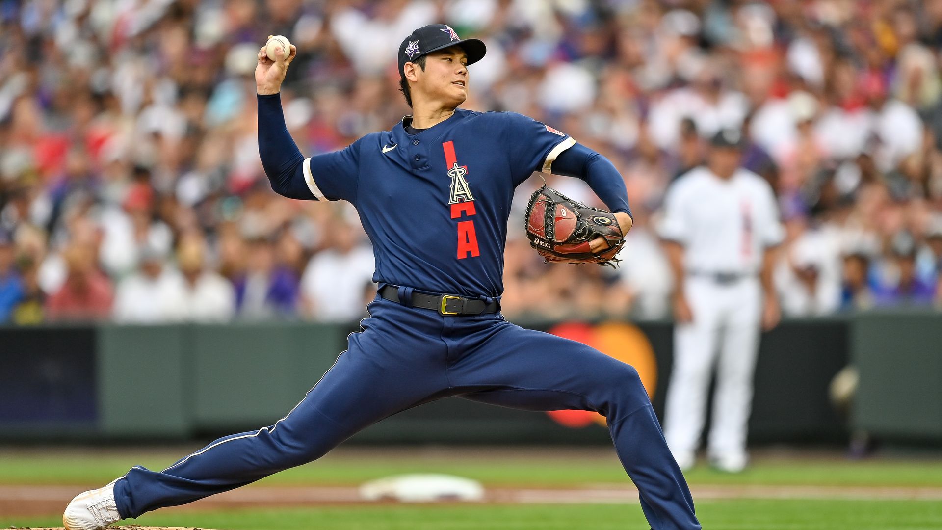 Shohei Ohtani #17 of the Los Angeles Angels pitches against the National League during the 91st MLB All-Star Game 