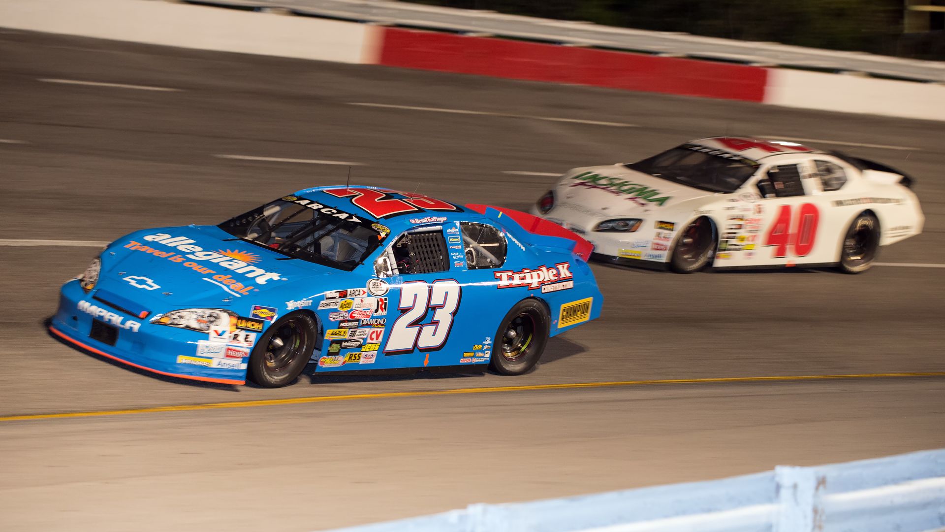 Cars at the fairgrounds racetrack