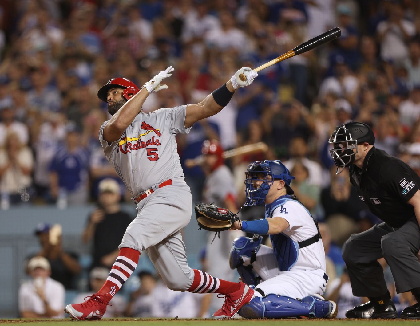 Albert Pujols and Roger Federer enjoy storybook endings