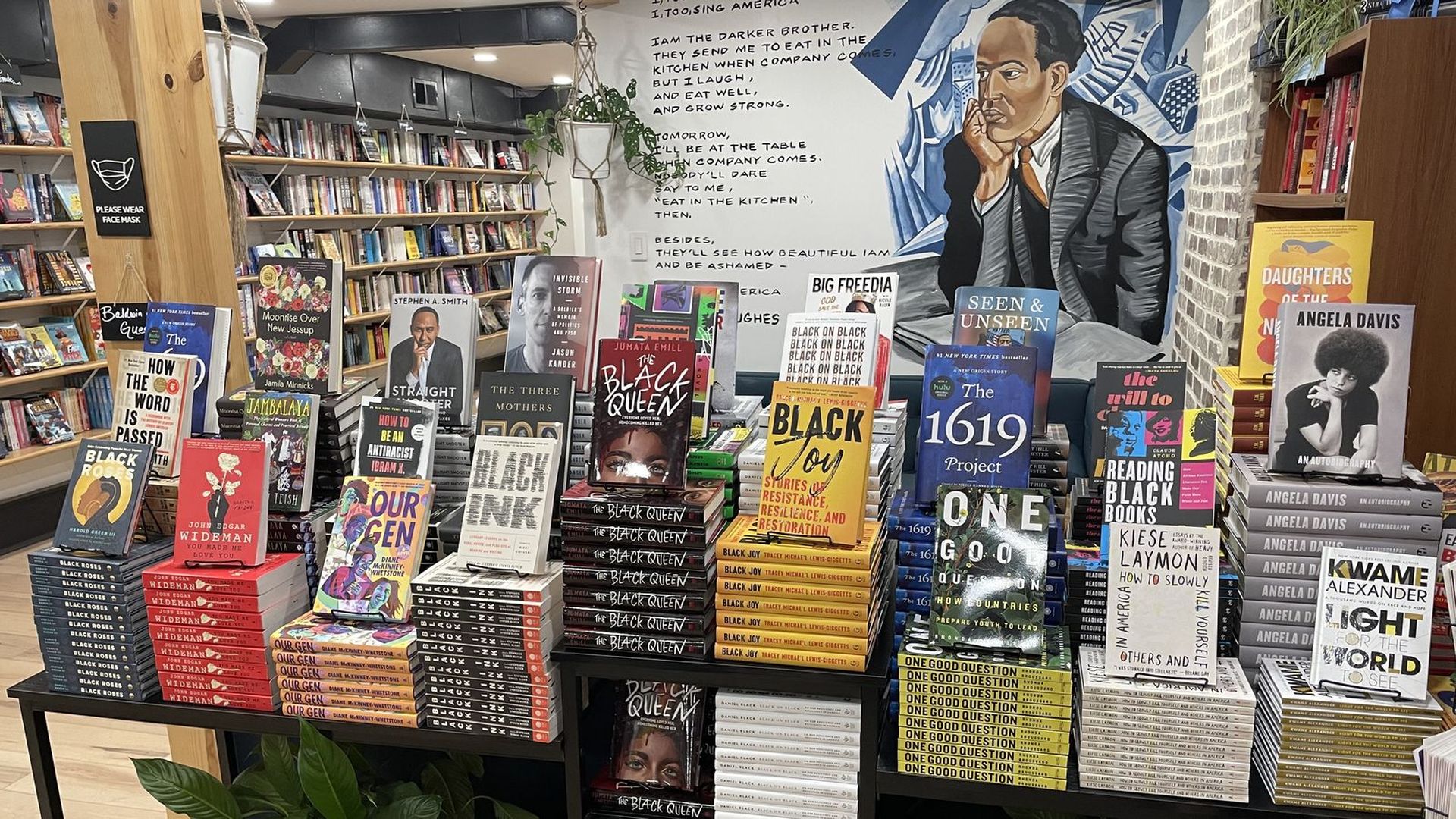 Photo shows a table displaying books. The titles are about Black culture and history.