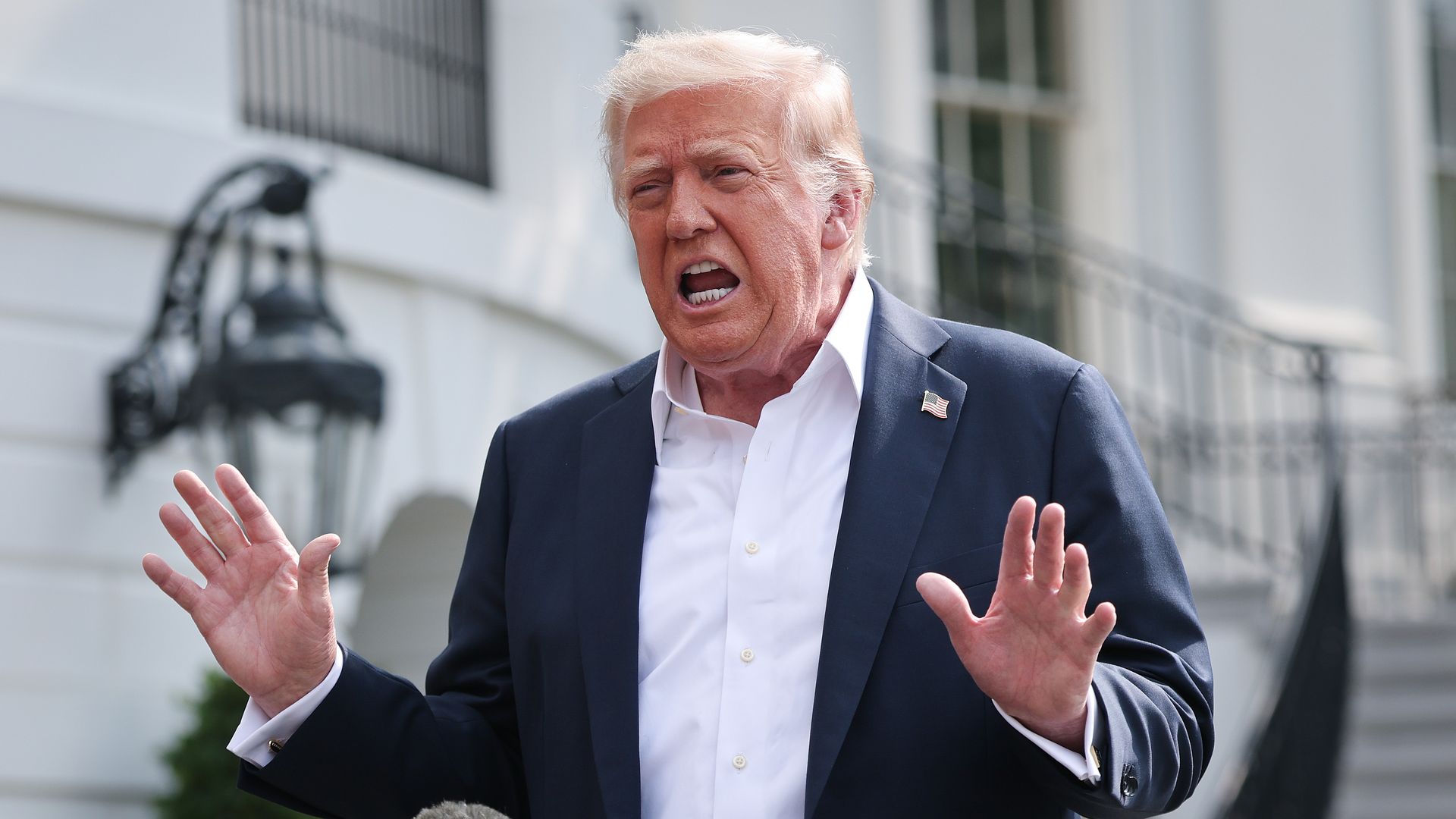 President Donald Trump answers questions while departing the White House on July 11, 2025 in Washington, DC. Trump is scheduled to travel to Central Texas today to meet with first responders and local elected officials involved with the recovery process from last week's flash flooding event that has