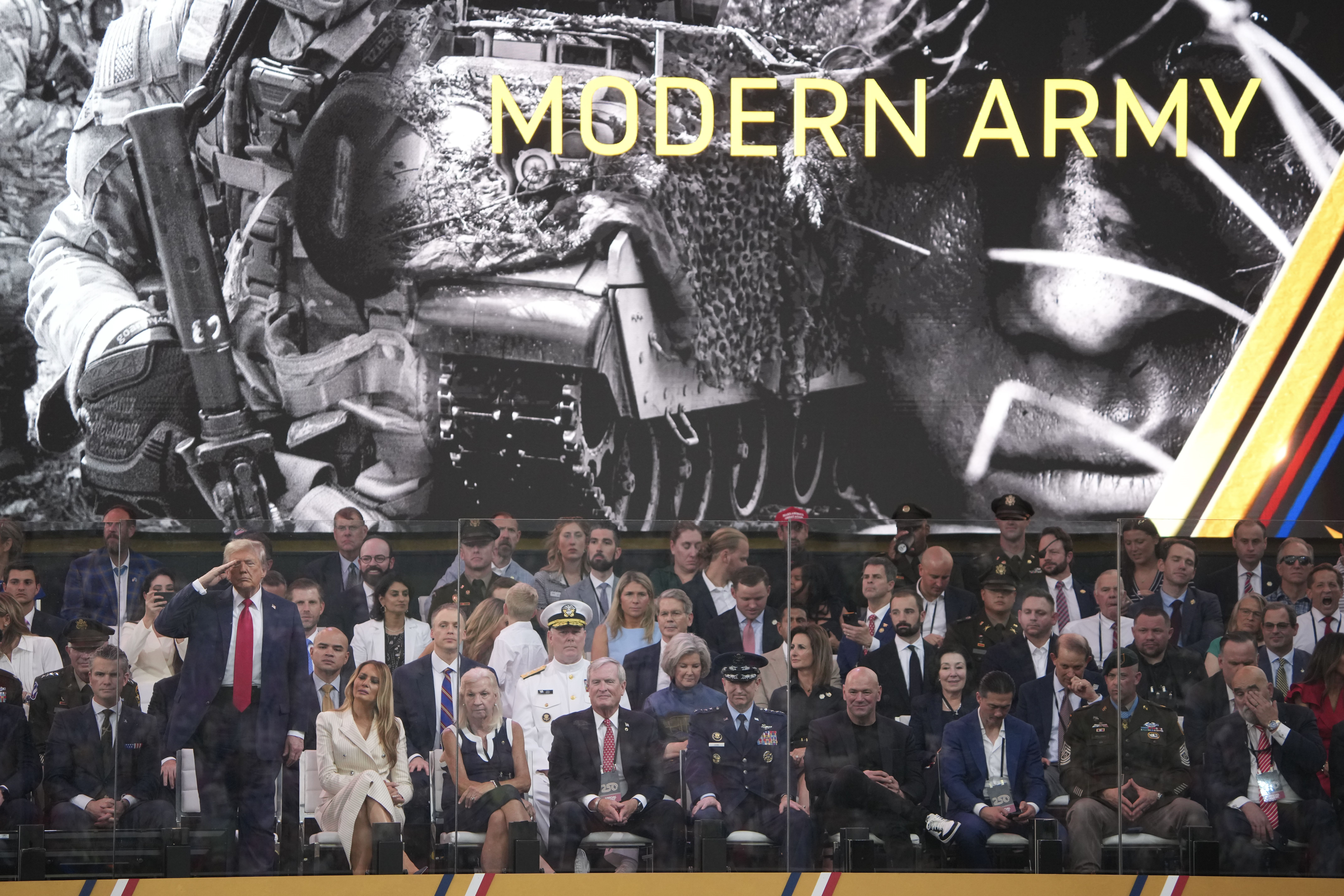 President Trump salutes as members of the U.S Army march past during the 250th birthday parade of the U.S. Army on June 14, 2025 in Washington, DC. 