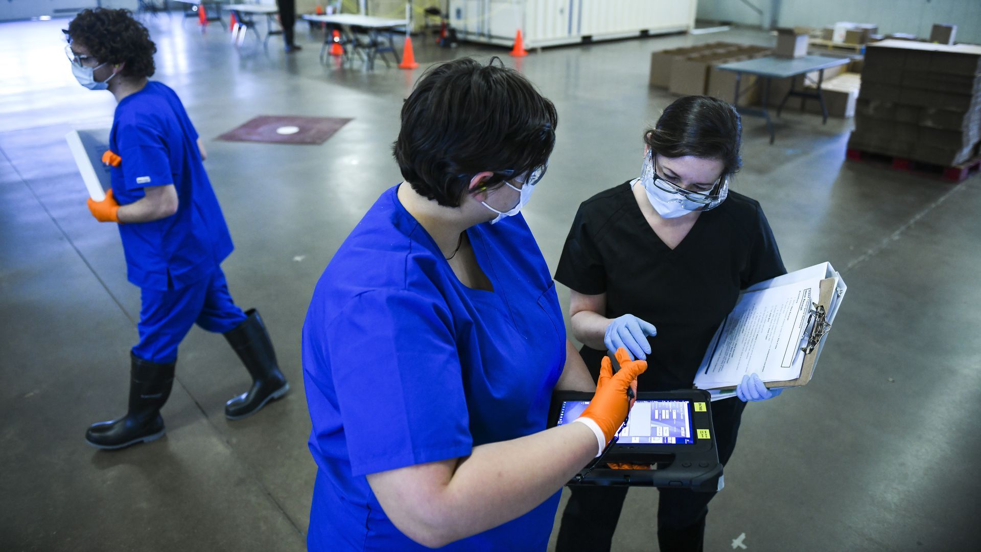 Technicians prepare to run a test of one of the new Battelle CCDS Critical Care Decontamination Systems delivered to Colorado by FEMA and HHS on May 8 in Brighton, Colorado.